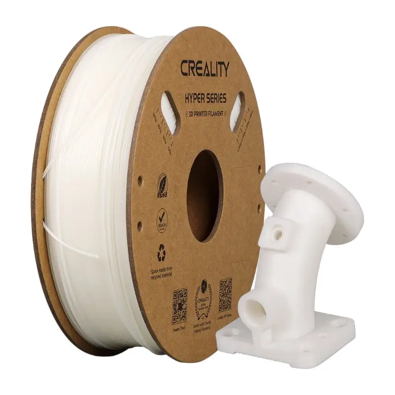 Una bobina di filamento bianco per stampante 3D e un oggetto bianco stampato su sfondo bianco.