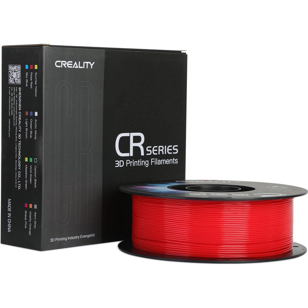 Una scatola nera e una bobina di filante rosso per stampante 3D serie CR su sfondo bianco.