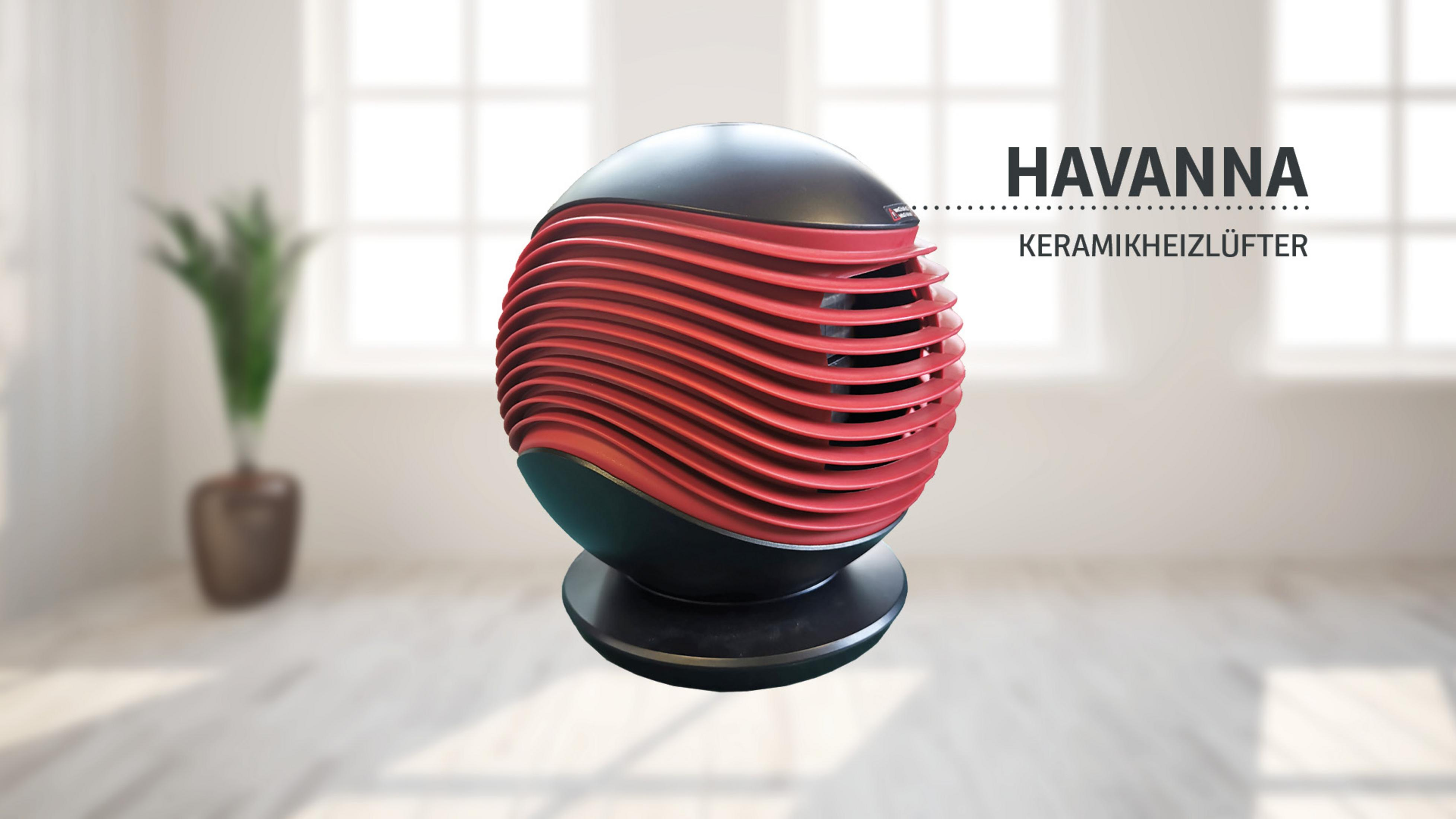 Termoventilatore ceramico rotondo nero e rosso di nome Havanna, in una stanza luminosa e sfocata con pianta.