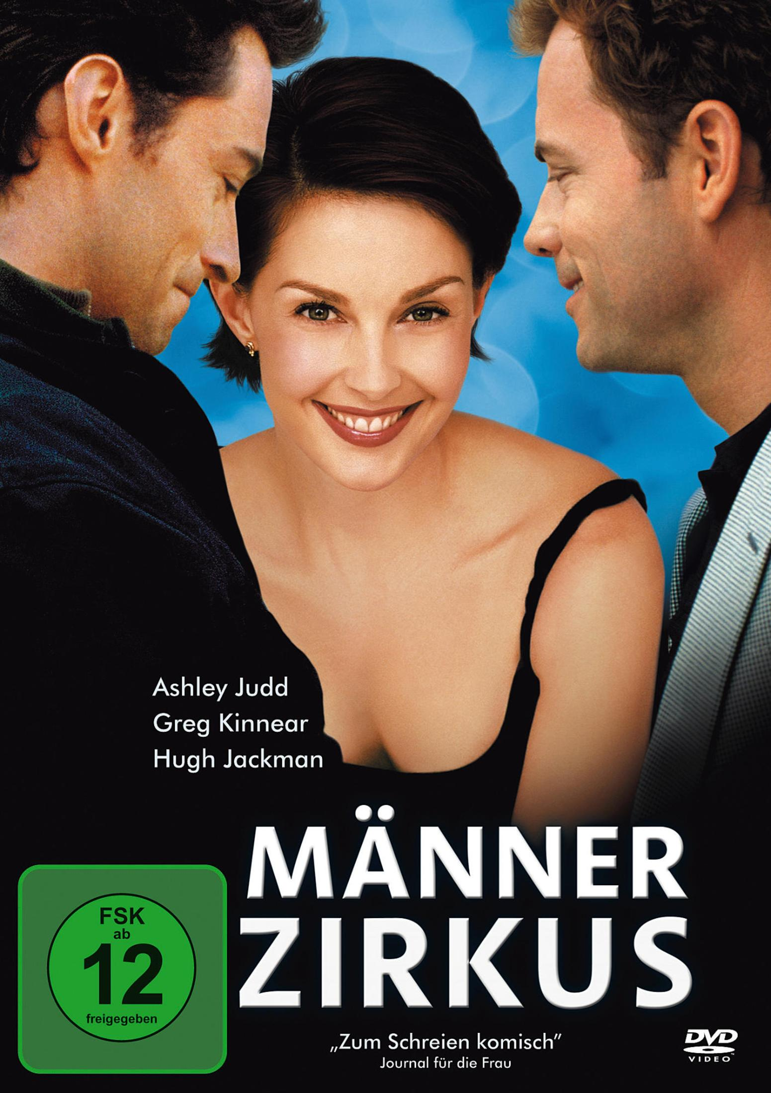 Ashley Judd in der Mitte lächelt, flankiert von Hugh Jackman links und Greg Kinnear rechts vor blauem Hintergrund.