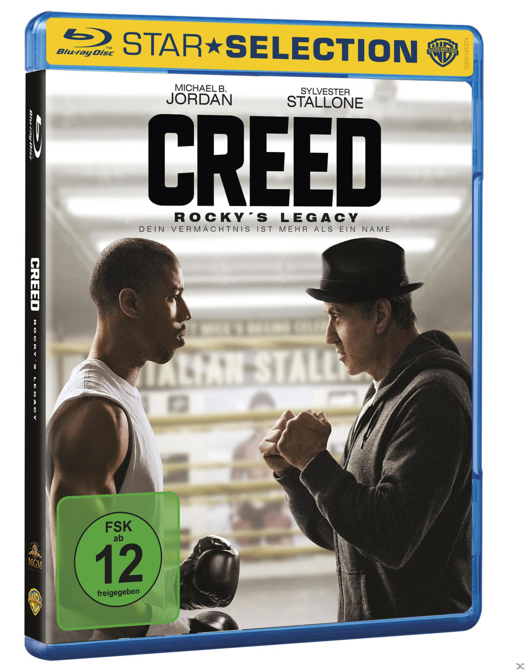 Blu-ray-Hülle des Films Creed mit Michael B. Jordan und Sylvester Stallone in einem Boxring.