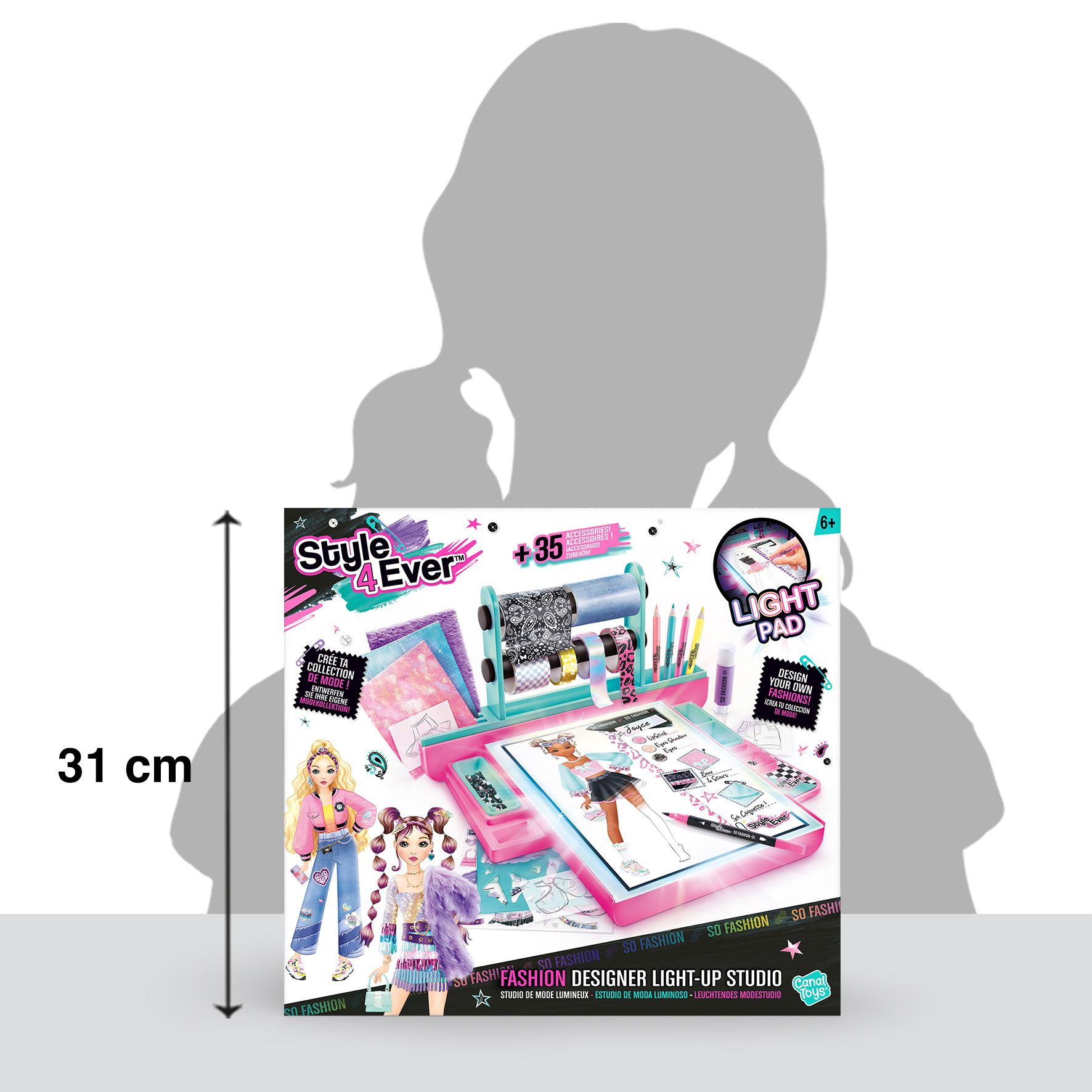 Juego de estudio de diseño de moda con una mesa de luz, rollos e ilustraciones de muñecas.