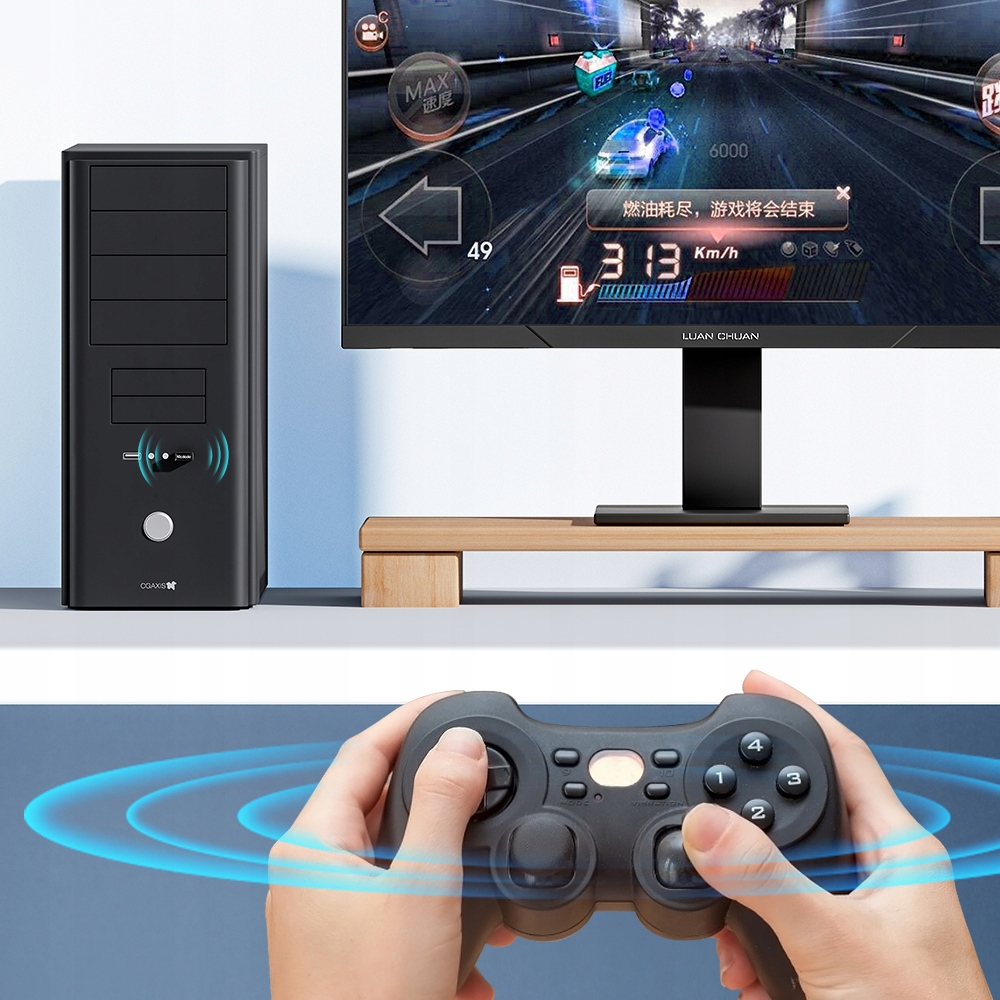 Un PC e un monitor nero mostrano un gioco di guida, controllato da un gamepad con onde di vibrazione.