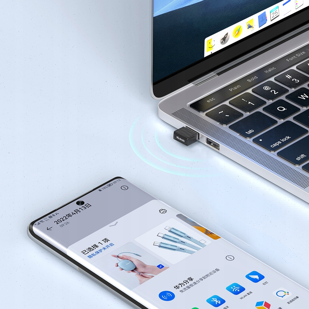 Un laptop con un adattatore USB e uno smartphone che mostra la condivisione di dati wireless su sfondo chiaro.