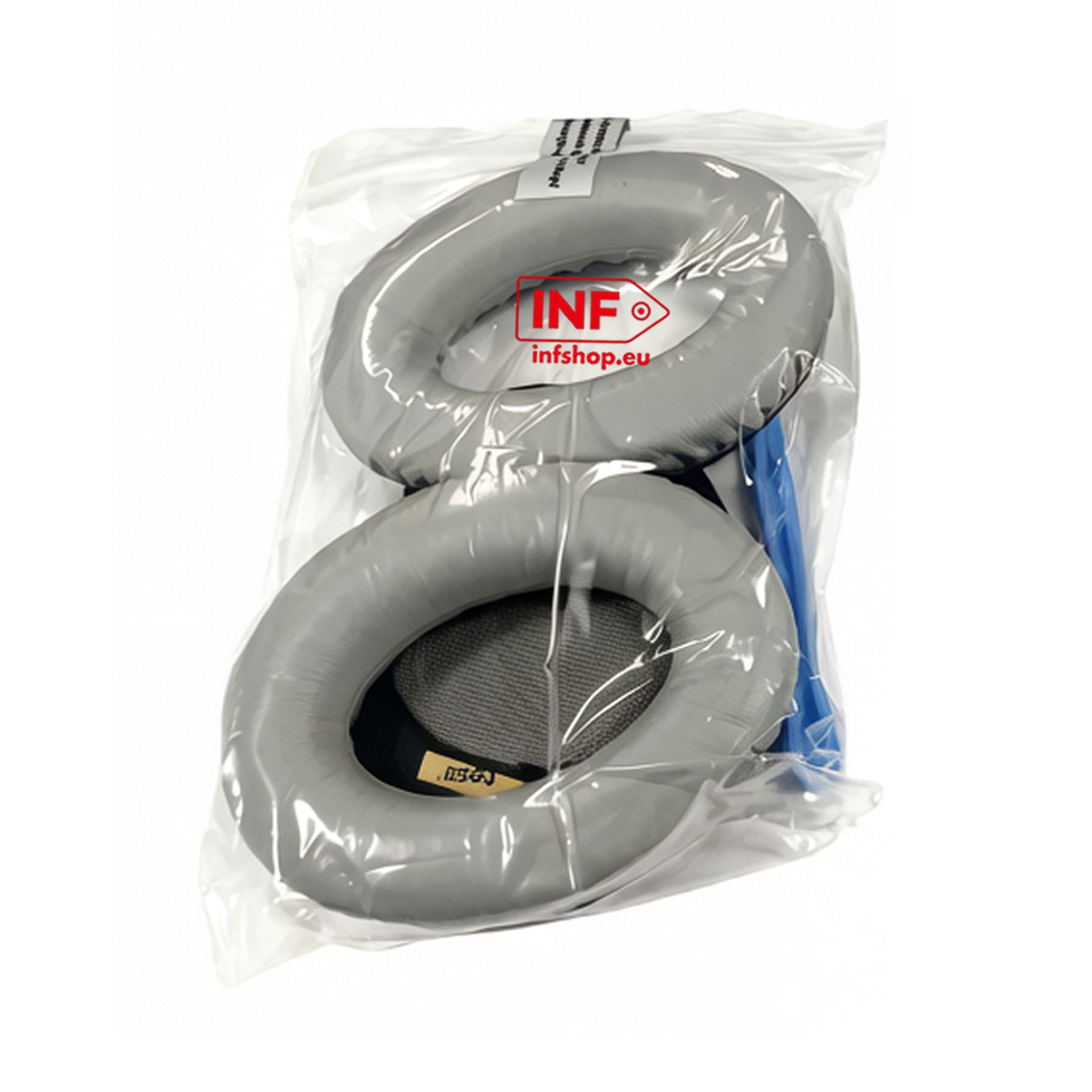 Coussins d'oreilles de rechange gris pour casque dans un sac.