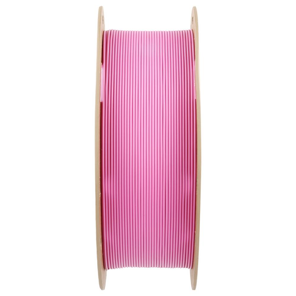 Una bobina di filamento rosa chiaro per stampante 3D su sfondo bianco.