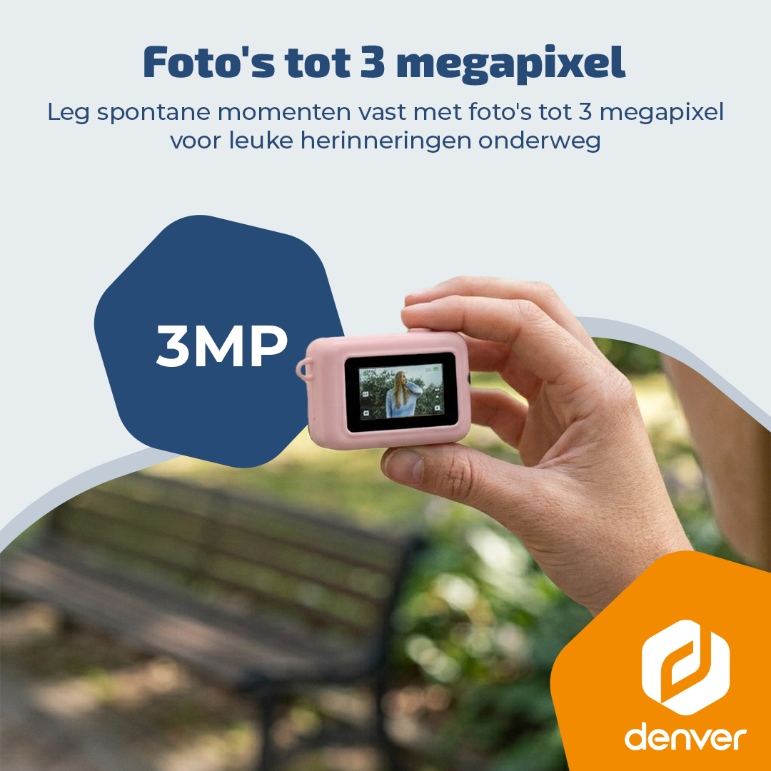 Hand vasthoudend een roze mini camera buiten met tekst over 3 megapixel foto's en Denver logo.