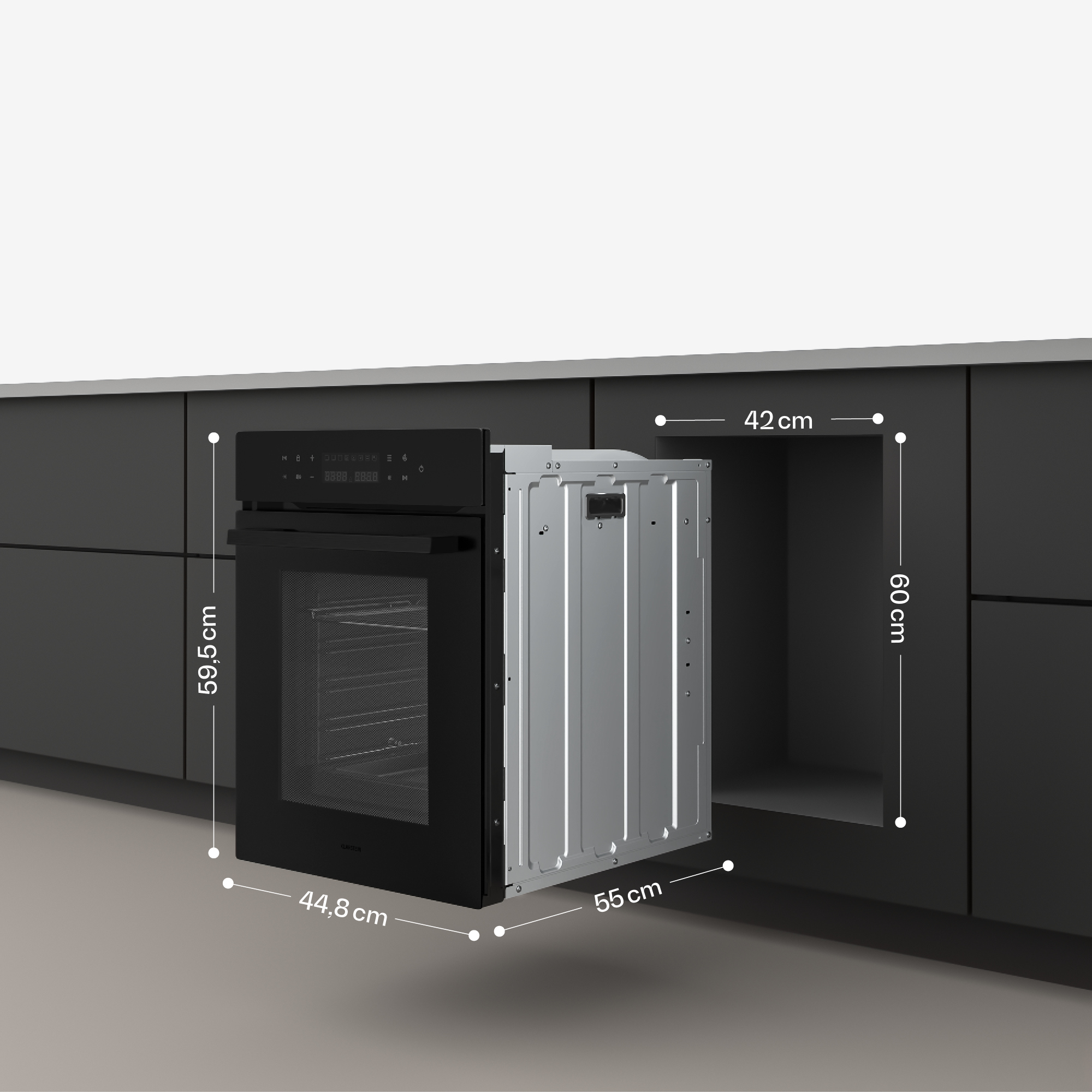 Ein schwarzer Ofen mit Maßangaben vor einem grauen Küchenschrank.
