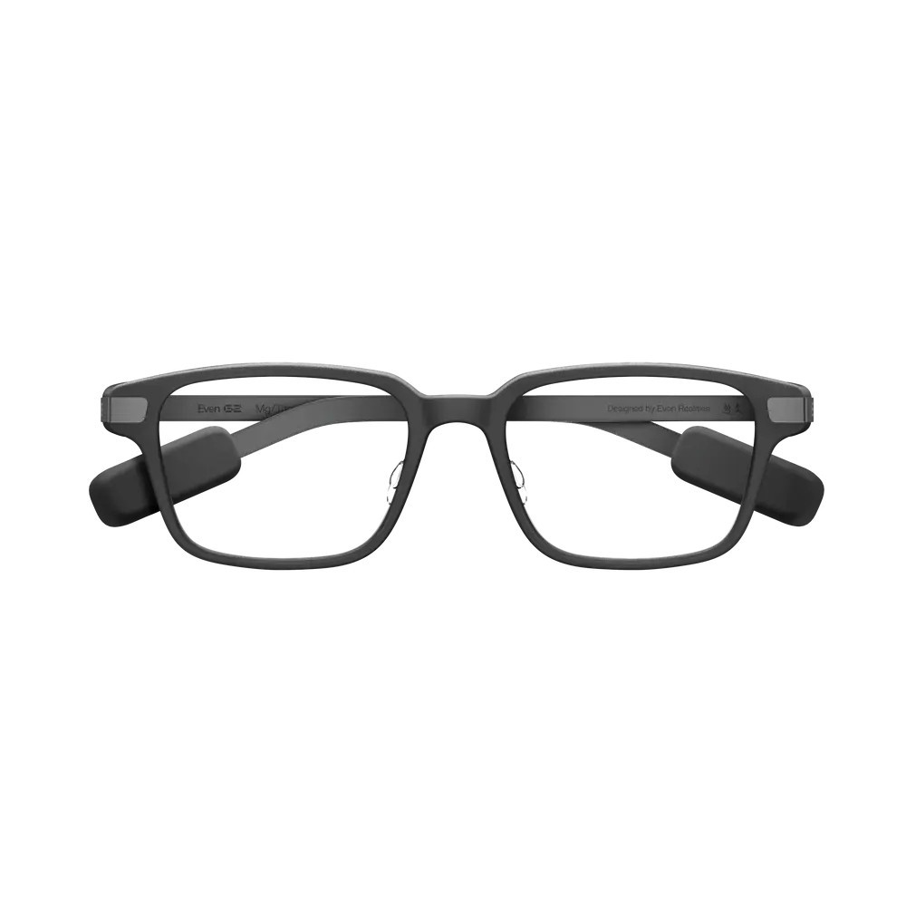 Gafas inteligentes negras con montura gruesa y patillas integradas sobre fondo blanco.