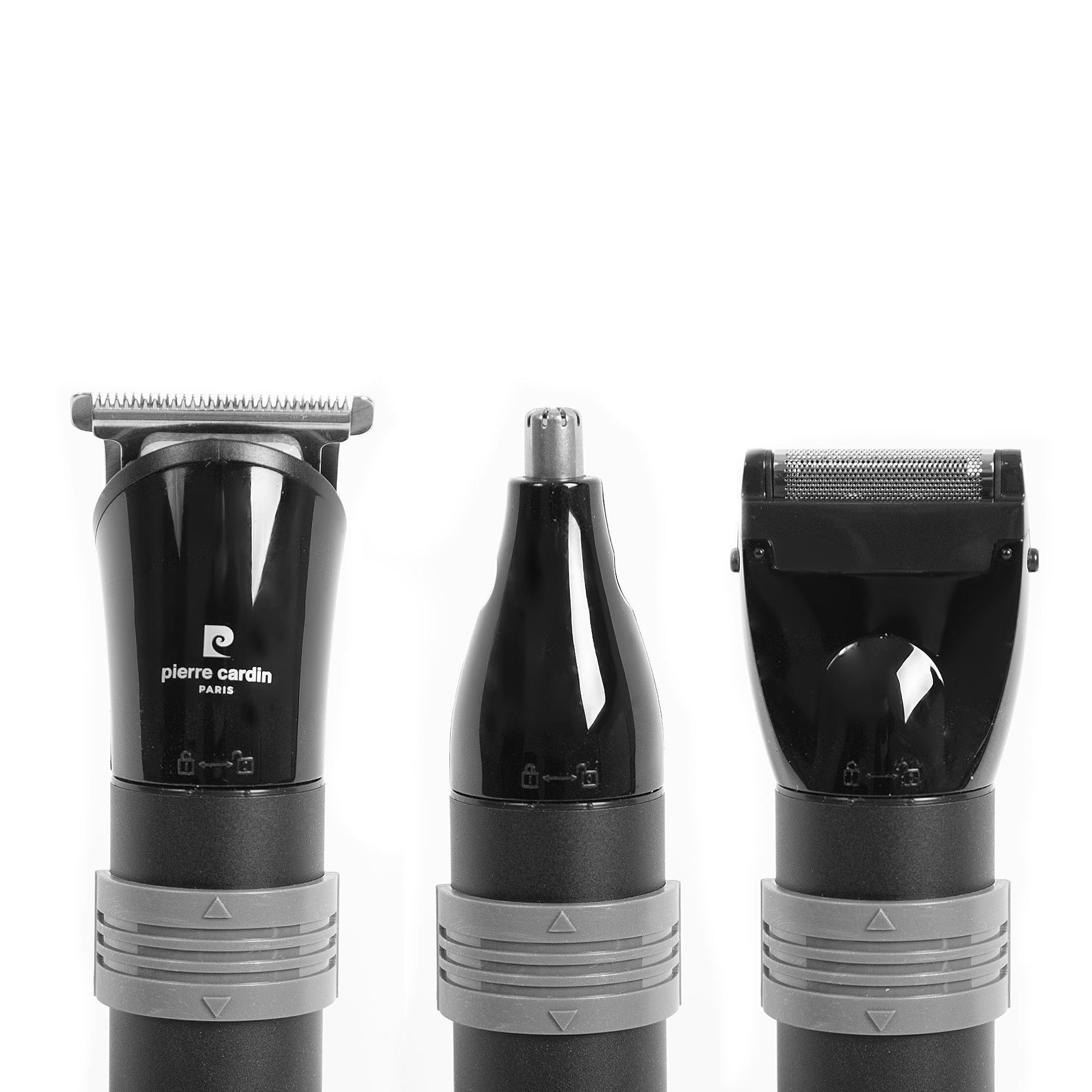 Beyaz arka planda değiştirilebilir başlıklara sahip üç siyah Pierre Cardin bakım cihazı.