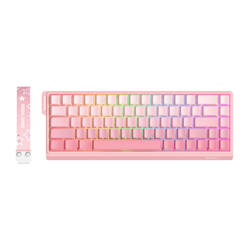 Tastiera da gioco rosa con retroilluminazione arcobaleno e un cinturino rosa abbinato decorato con stelle.