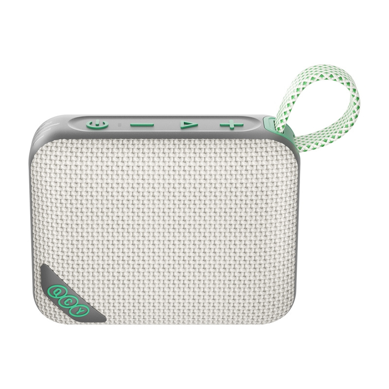 Untop altoparlante Bluetooth grigio con copriobiettivo in tessuto bianco, controlli verdi e cinturino verde.
