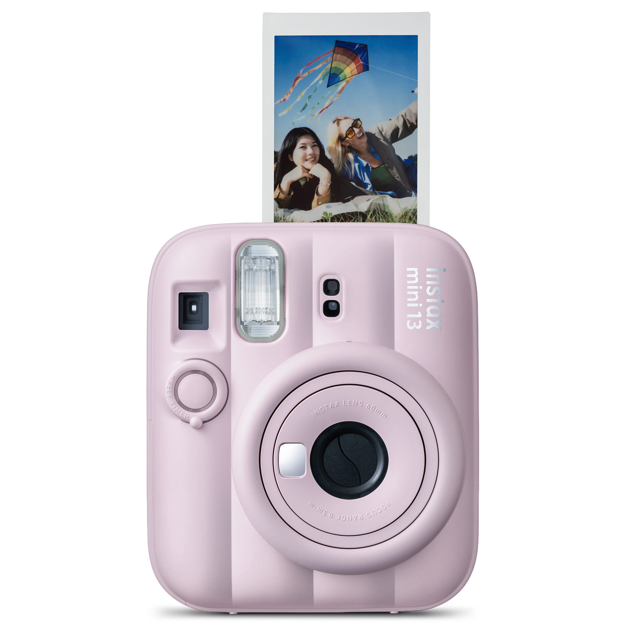 Uçurtma uçuran gülümseyen iki kadının basılı fotoğrafını gösteren pembe şipşak kamera.
