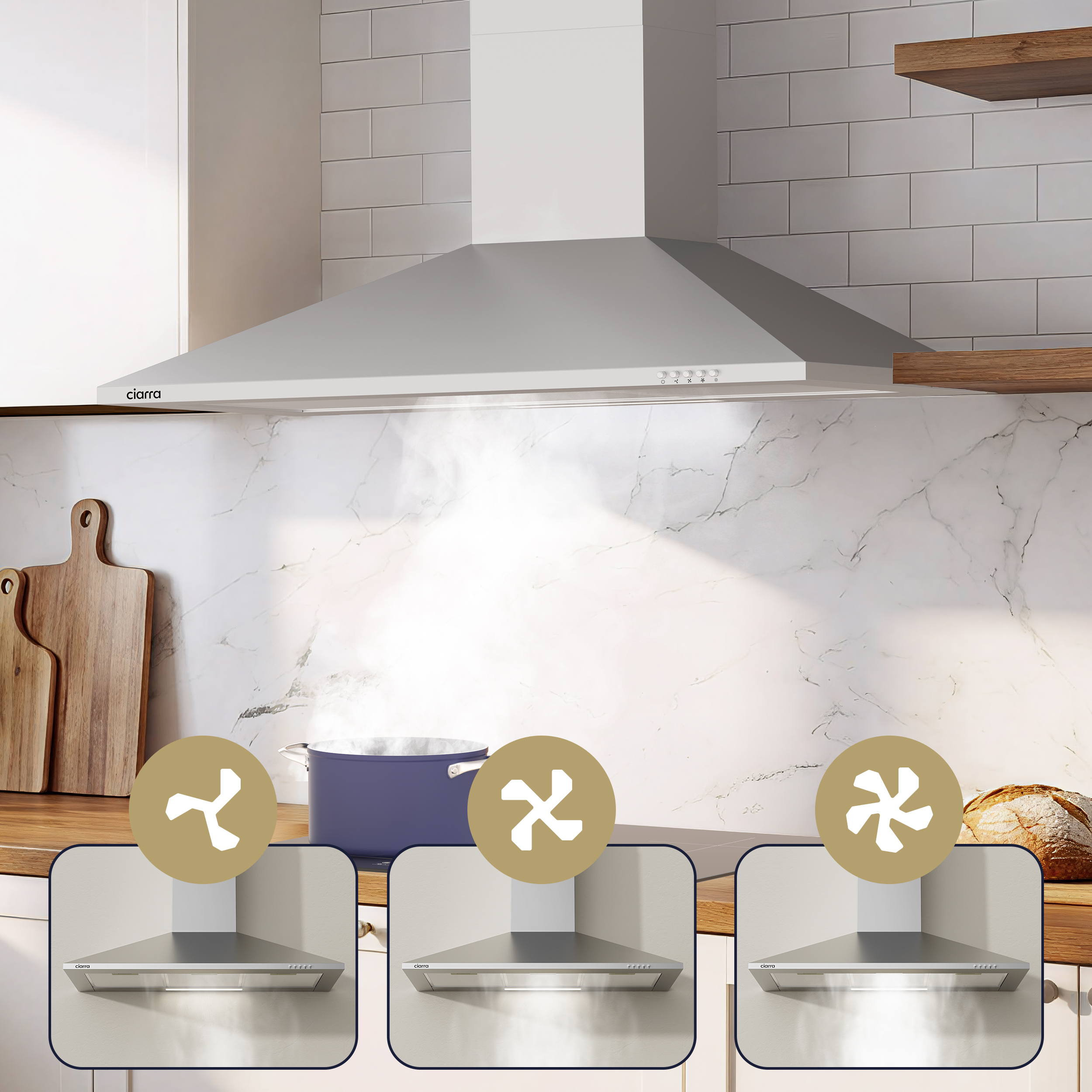 Hotte en acier inoxydable dans une cuisine moderne avec casserole et trois encarts.