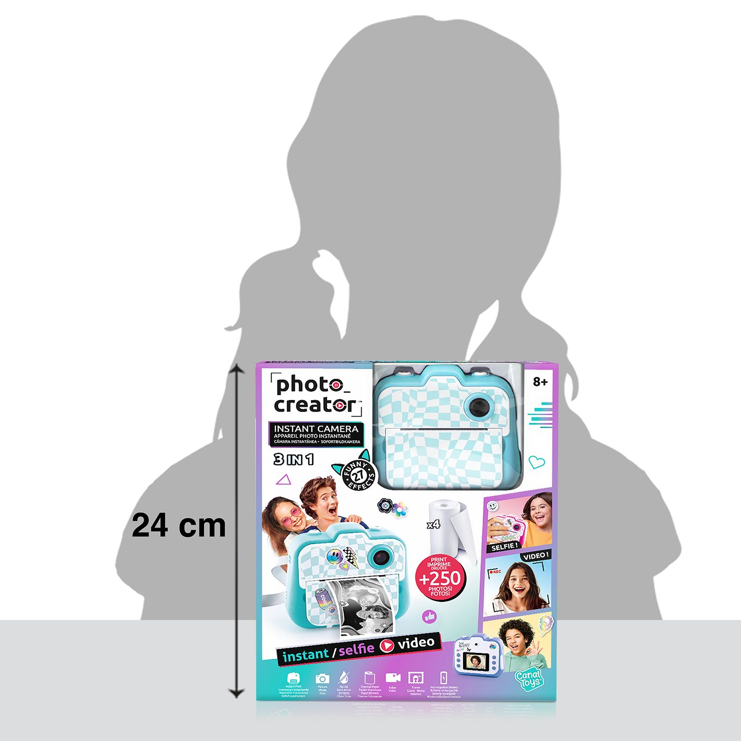 Empaque de cámara instantánea Photo Creator frente a la silueta de un niño, con 24 cm de alto.