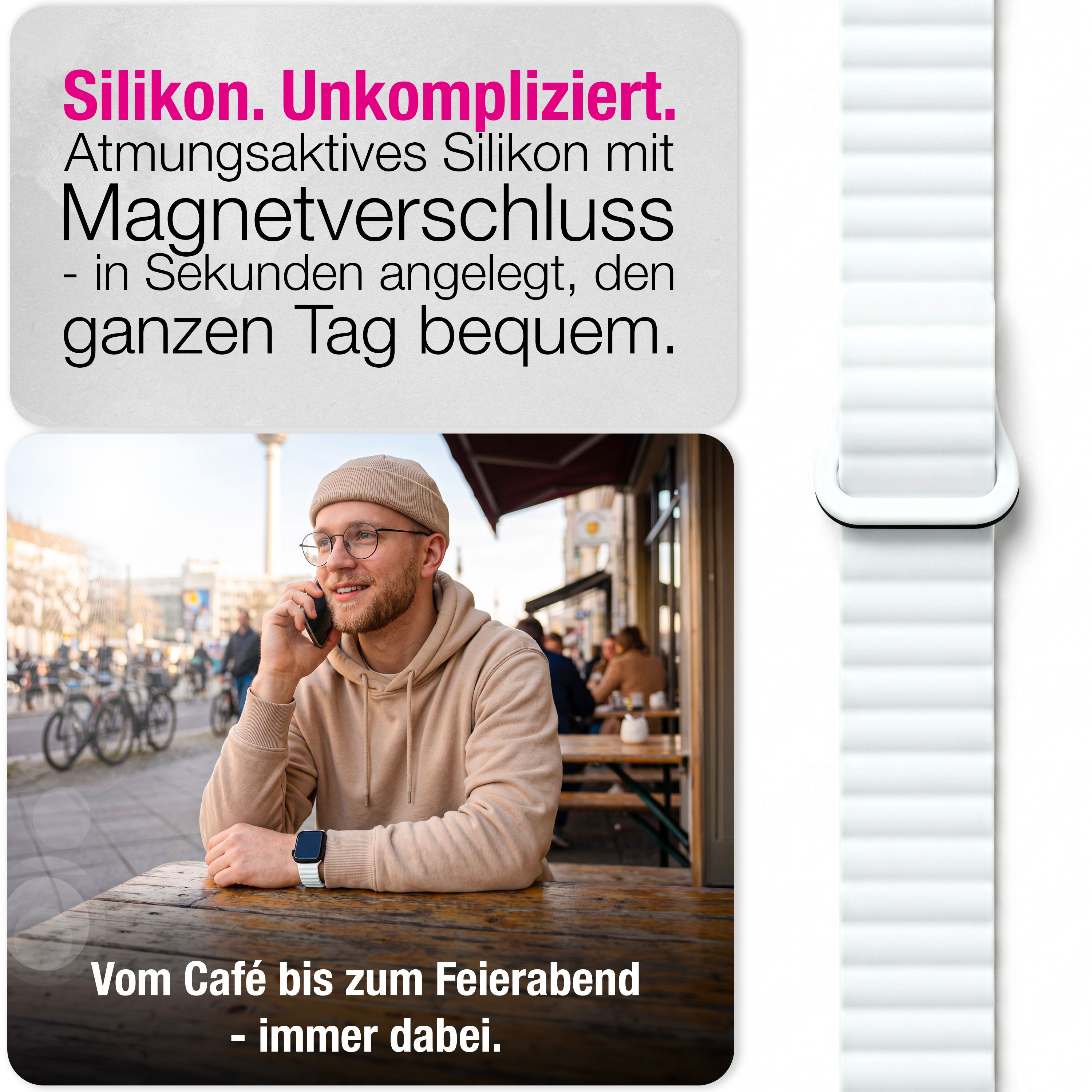 Ein Mann mit Beanie sitzt an einem Holztisch im Café, telefoniert und trägt eine Smartwatch mit weißem Armband.