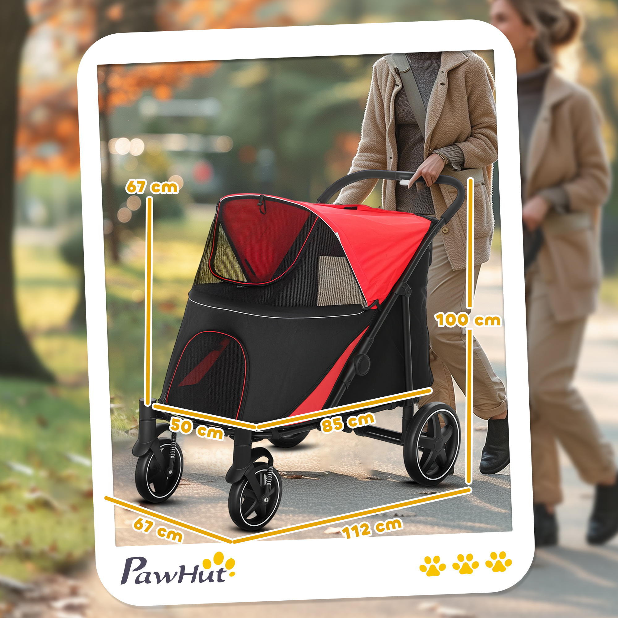 Un carrito para mascotas rojo y negro con dimensiones en un parque.