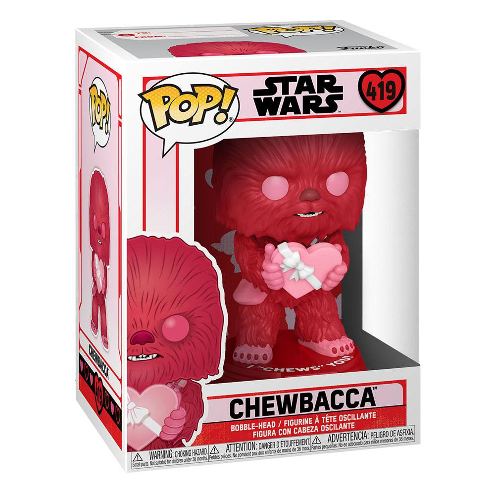 Eine Star Wars Chewbacca Funko Pop Figur in Rot, die ein rosa Herz hält, in der Verpackung.