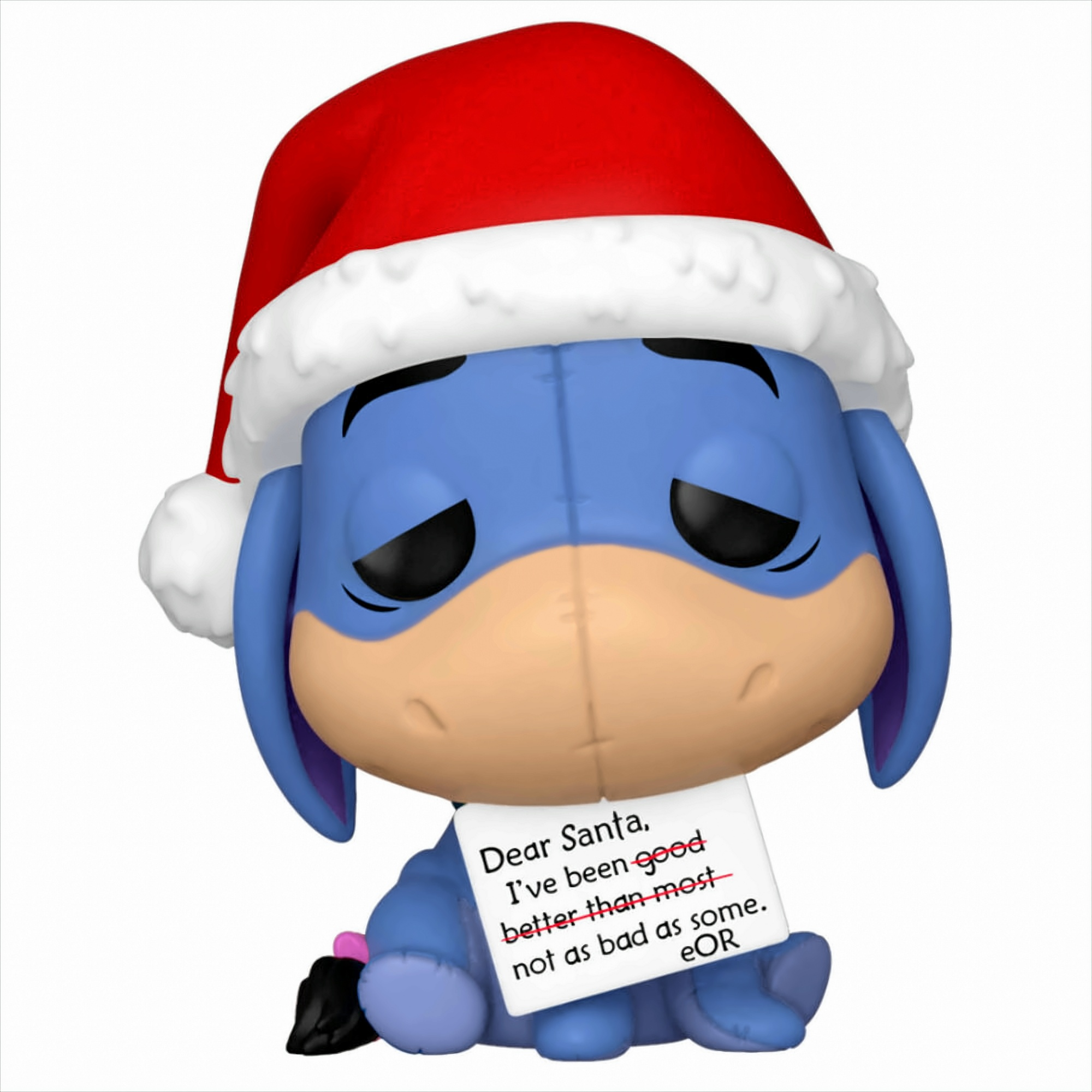 Statuetta di Ih-Oh con cappello da Babbo Natale che tiene un biglietto, su sfondo bianco.