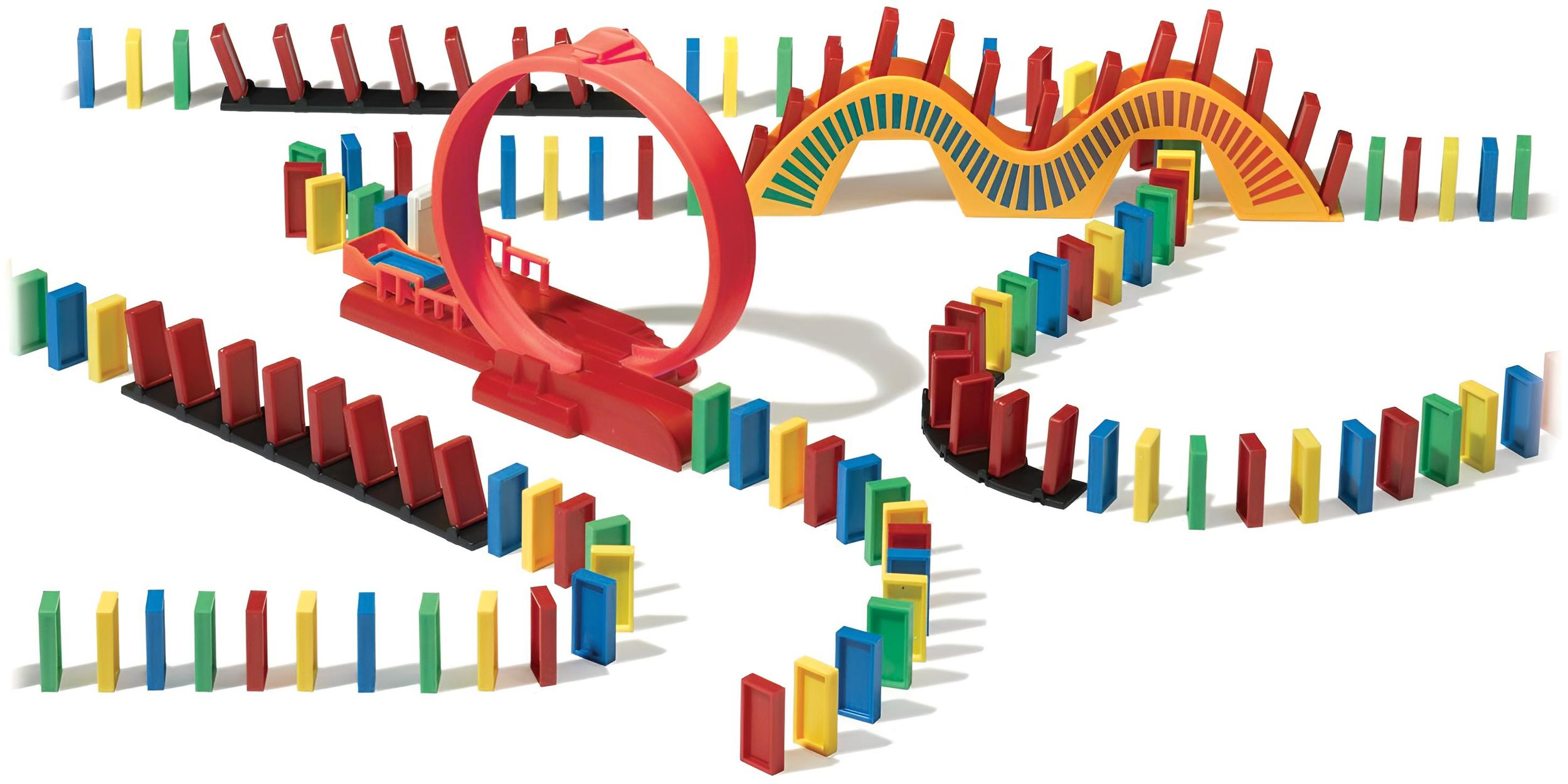 Ein buntes Plastik-Dominospiel mit rotem Looping, gelber Welle und bunten Steinen auf weißem Hintergrund.