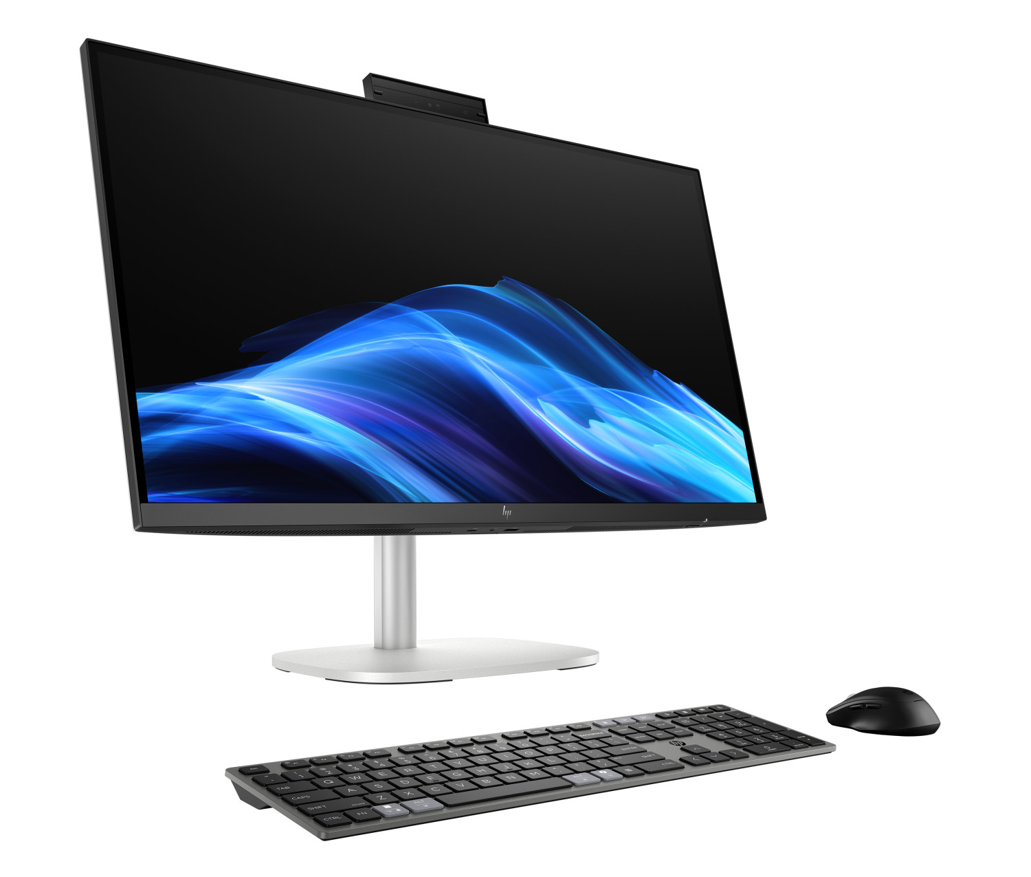 Un monitor per computer nero con sfondo a onde astratte blu, supporto argentato, tastiera e mouse.