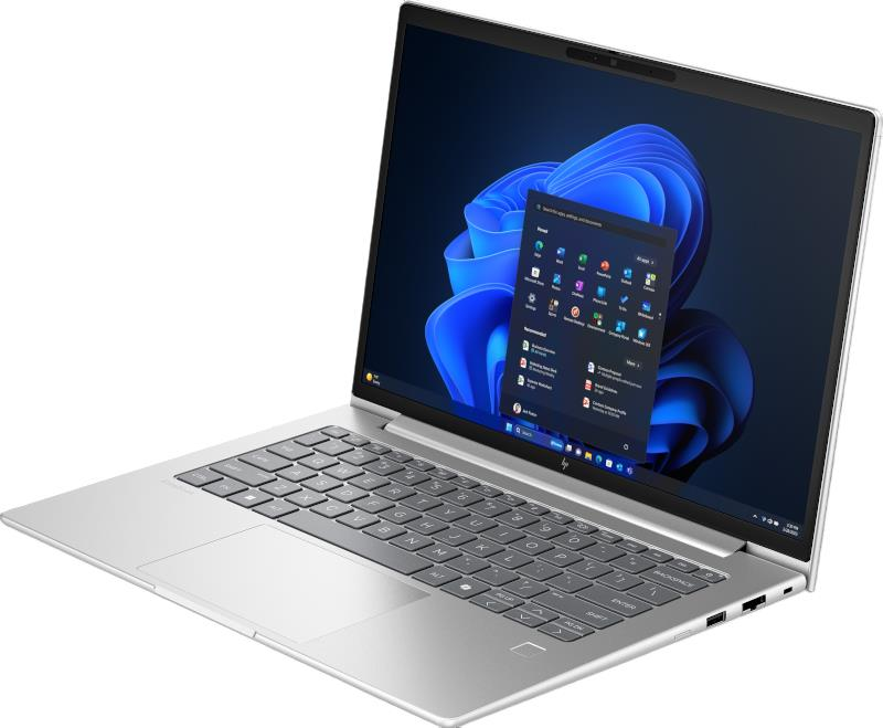 Ekranında aydınlatılmış mavi bir Windows 11 başlat menüsü olan gümüş renkli dizüstü bilgisayar.