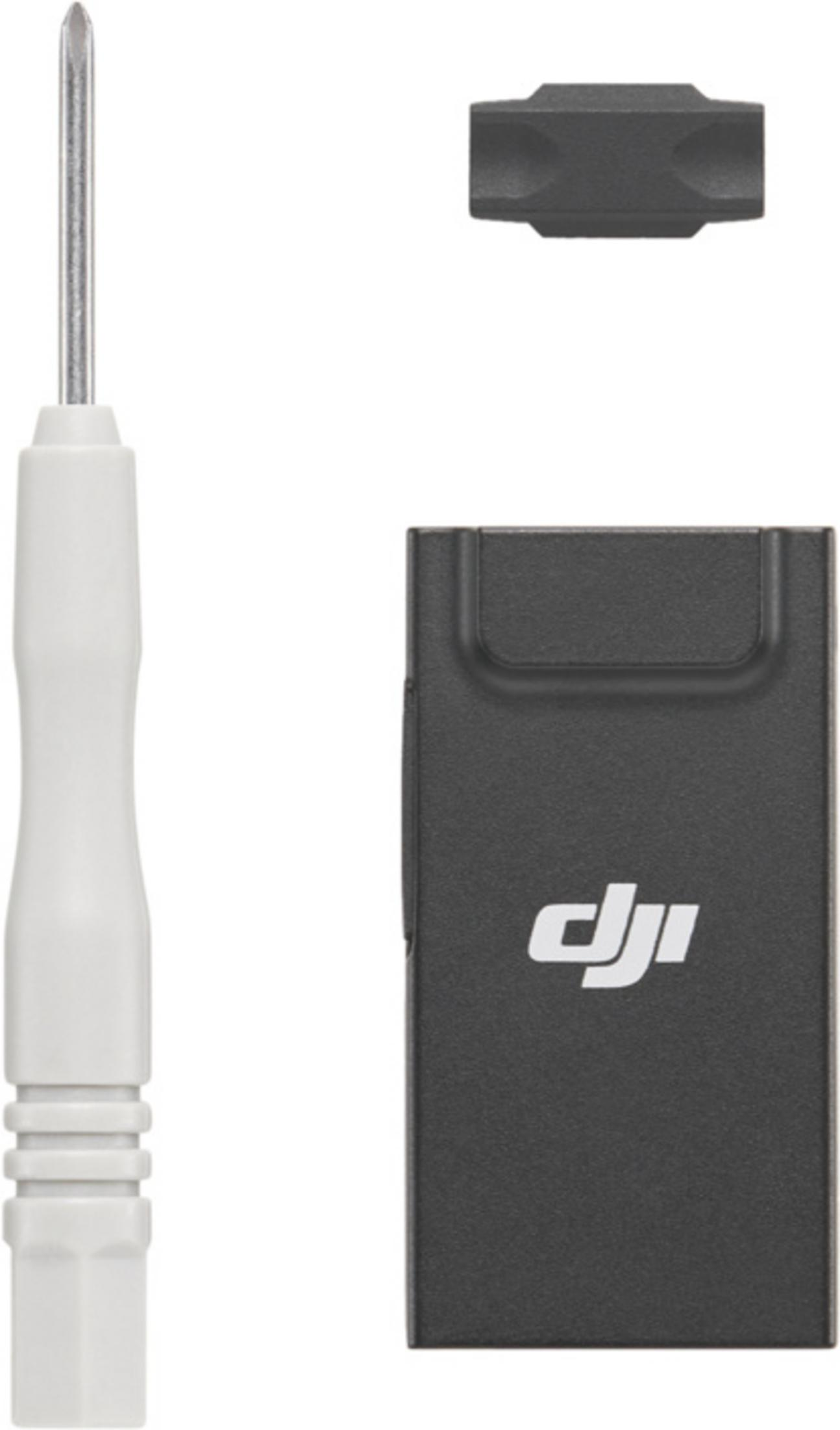 Un cacciavite bianco e un dispositivo DJI nero su sfondo bianco.
