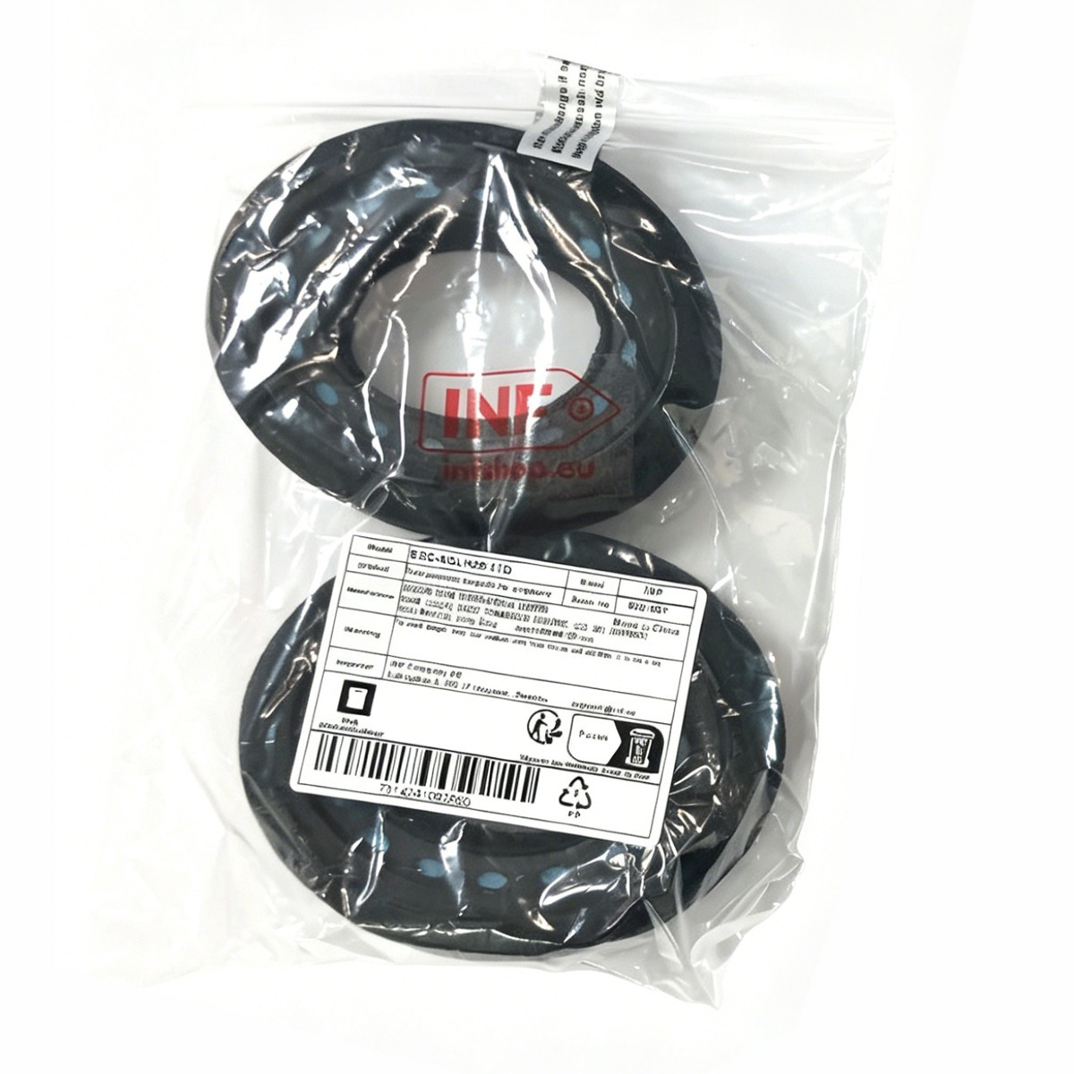 Zwei schwarze Dichtungsringe in einer verschlossenen Plastiktüte mit Versandetikett und Logo.