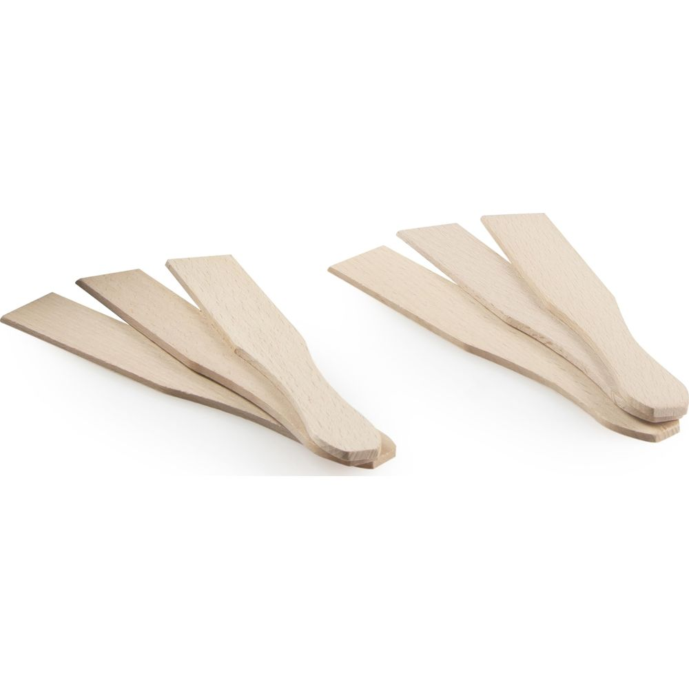 Six spatules en bois disposées en deux groupes sur fond blanc.
