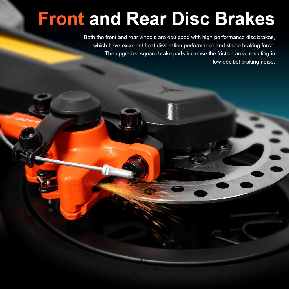 Vista dettagliata di un freno a disco arancione per monopattino con scintille.