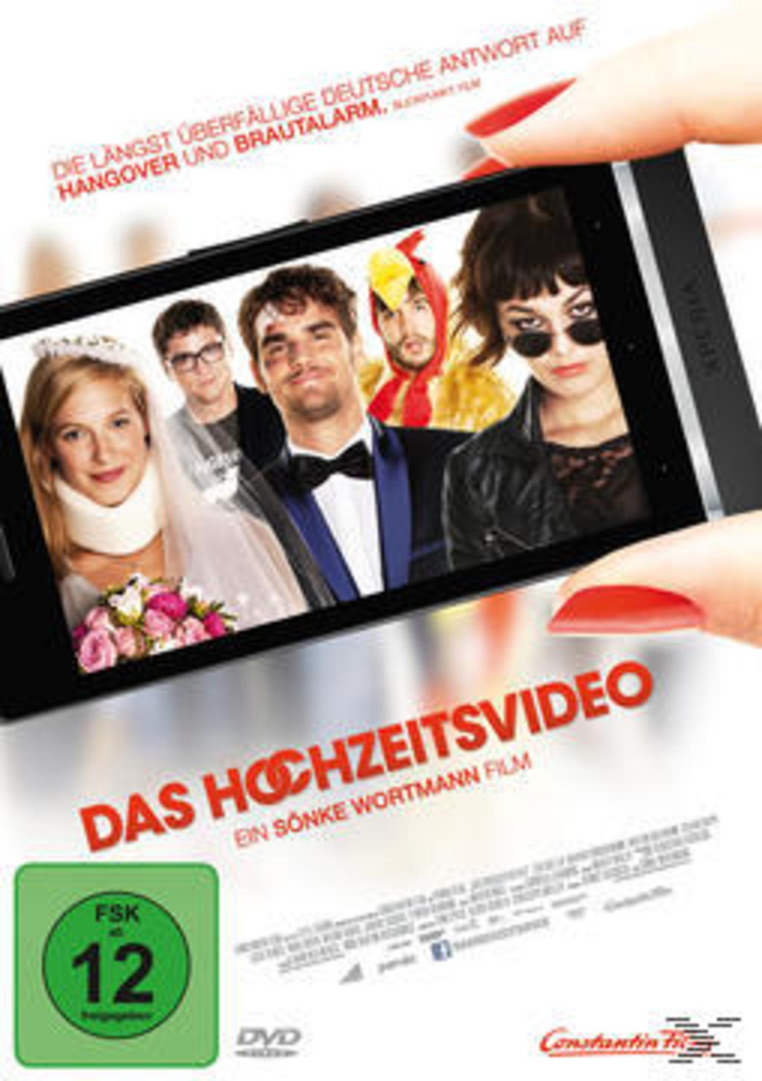 DVD-Cover von Das Hochzeitsvideo mit einer Hand, die ein Smartphone hält, und fünf verkaterten Personen.