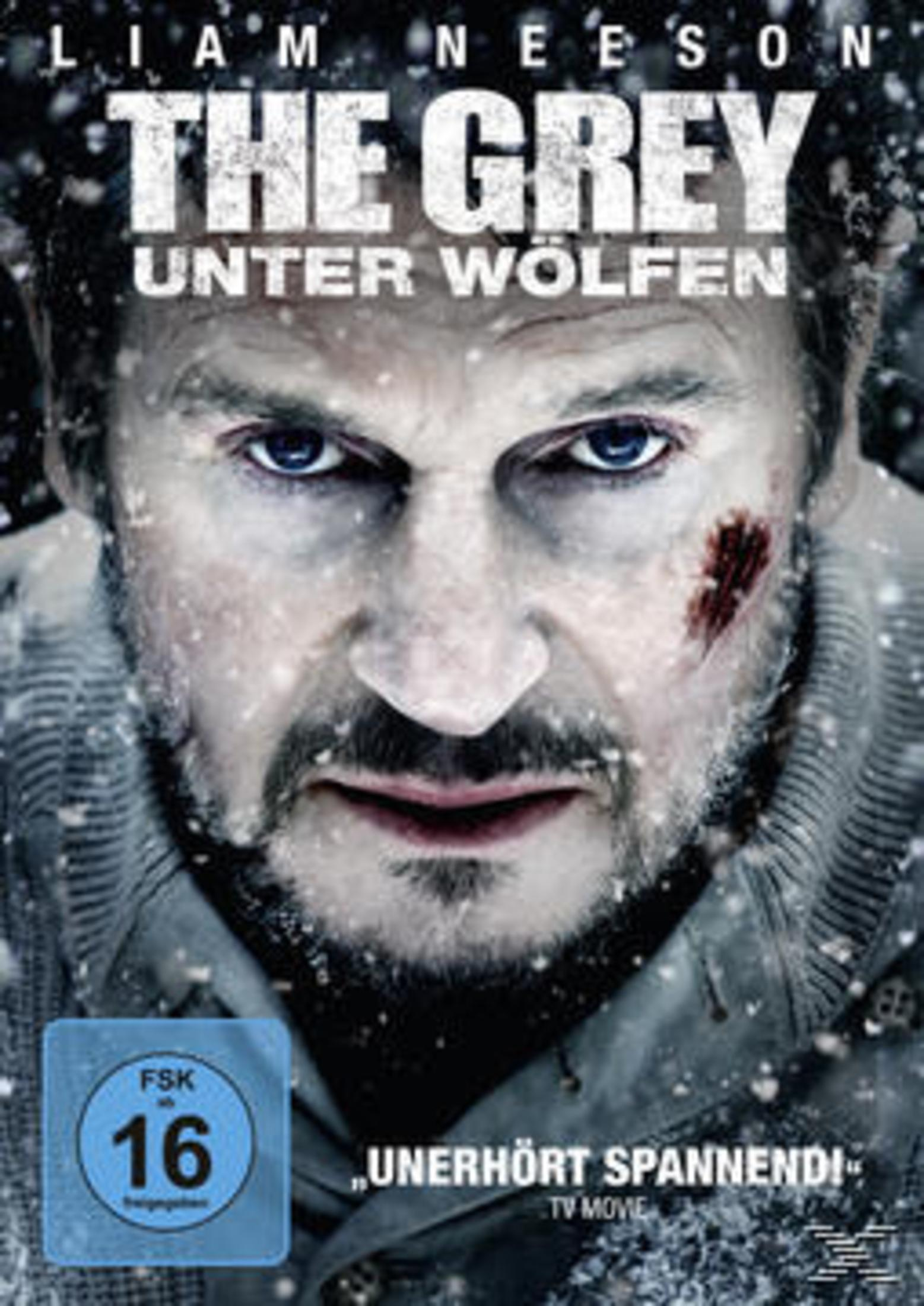 Nahaufnahme von Liam Neeson mit verletztem Gesicht im Schnee für den Film The Grey.