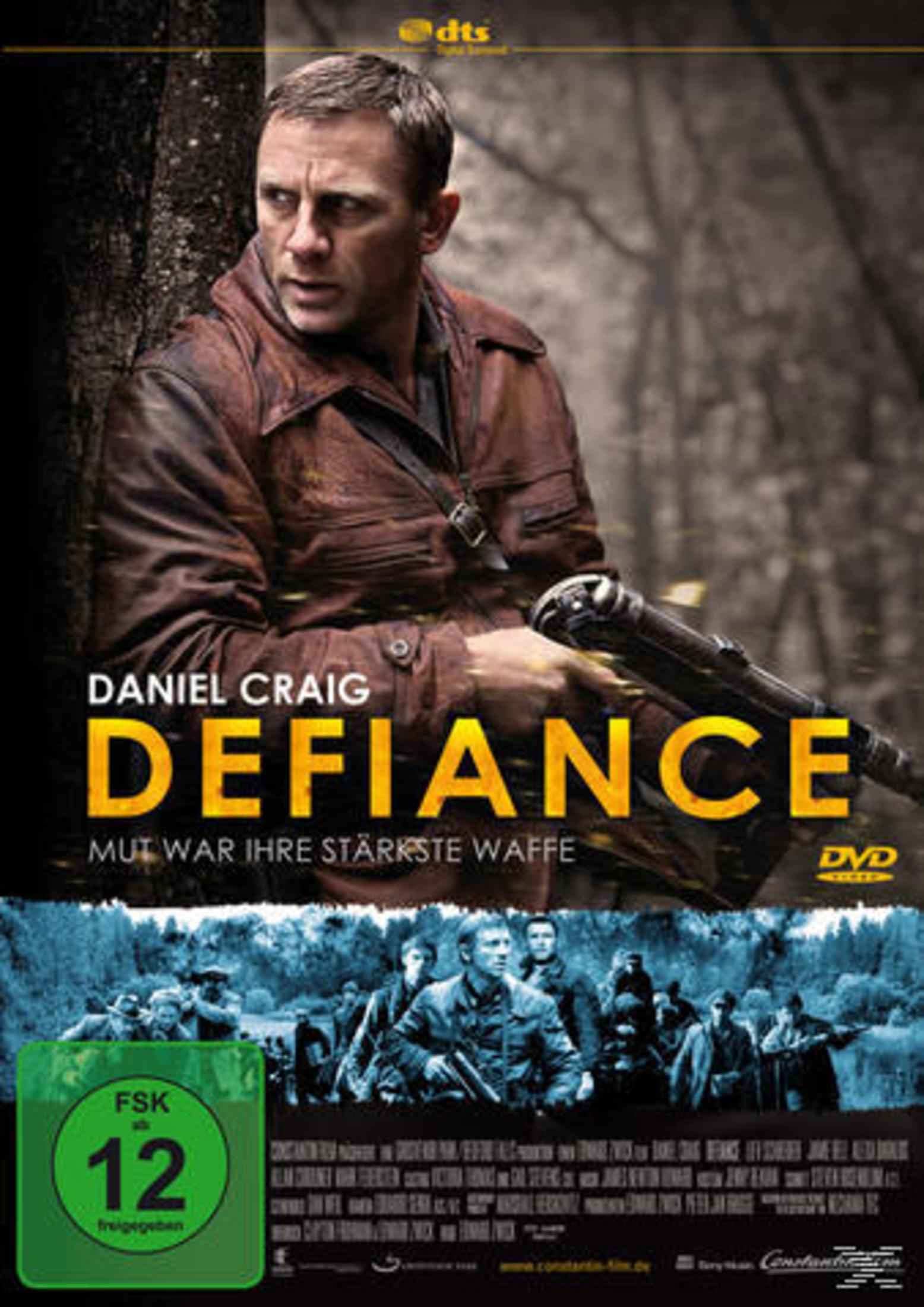 Daniel Craig hält in dem Filmplakat "Defiance" eine Waffe im Wald.