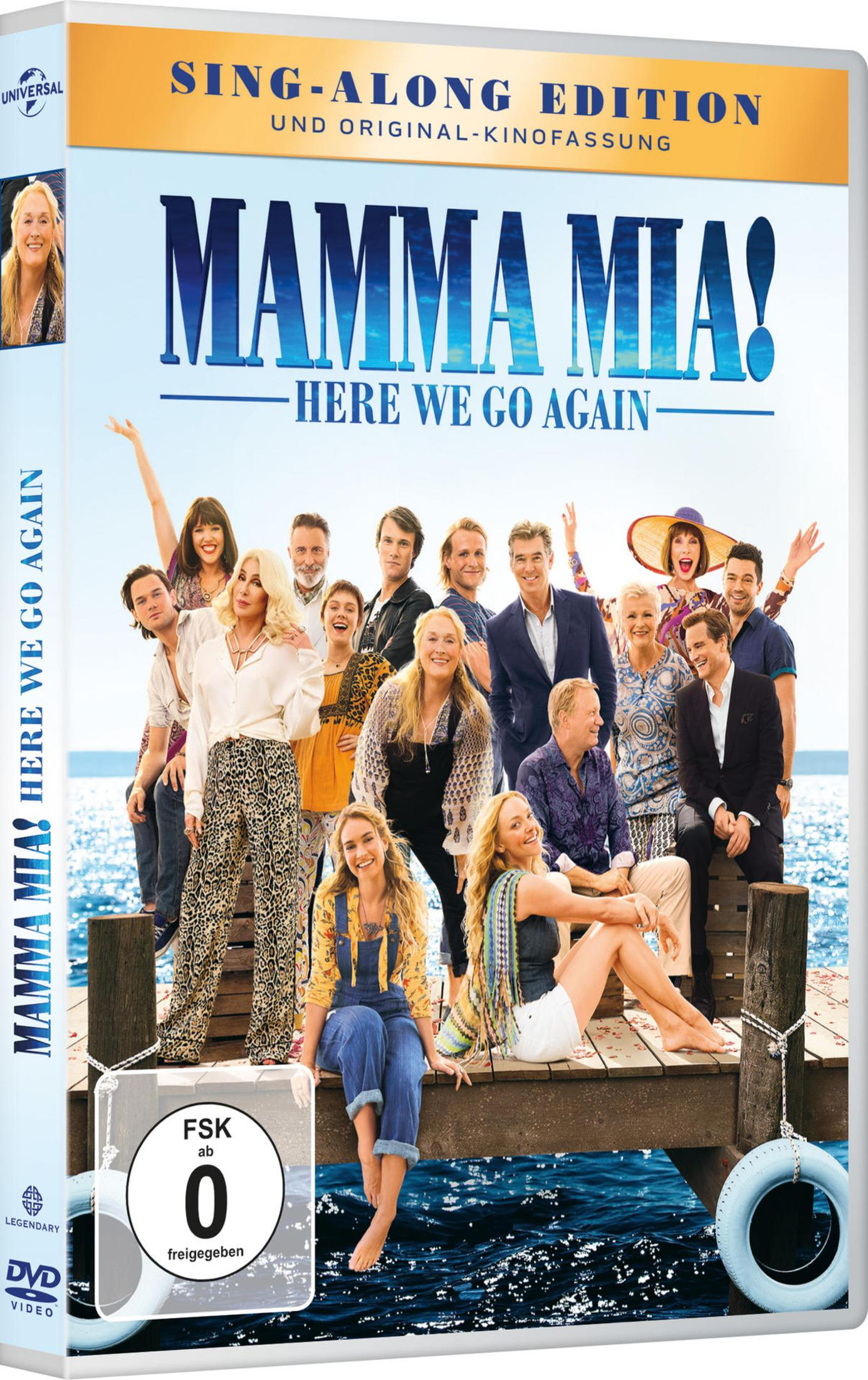 DVD-Cover von Mamma Mia! Here We Go Again mit dem lachenden Cast auf einem Holzsteg am Meer.