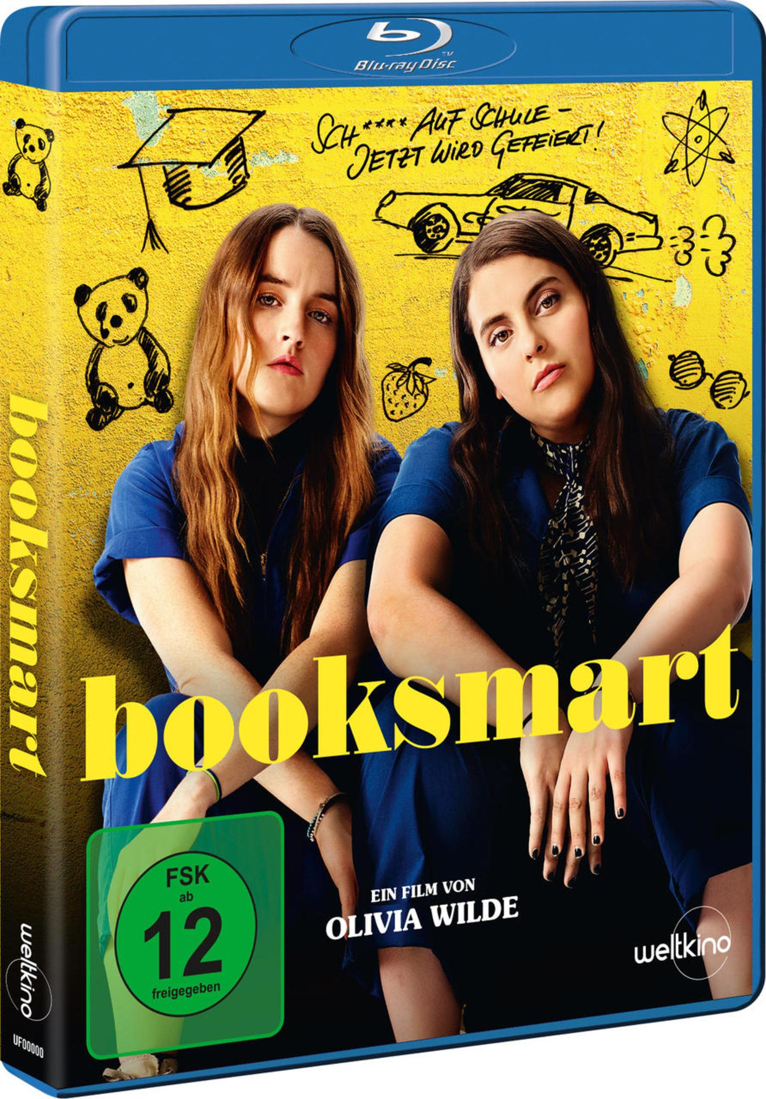 Blu-ray-Hülle des Films Booksmart mit zwei jungen Frauen vor gelbem, bekritzeltem Hintergrund und FSK-12-Logo.