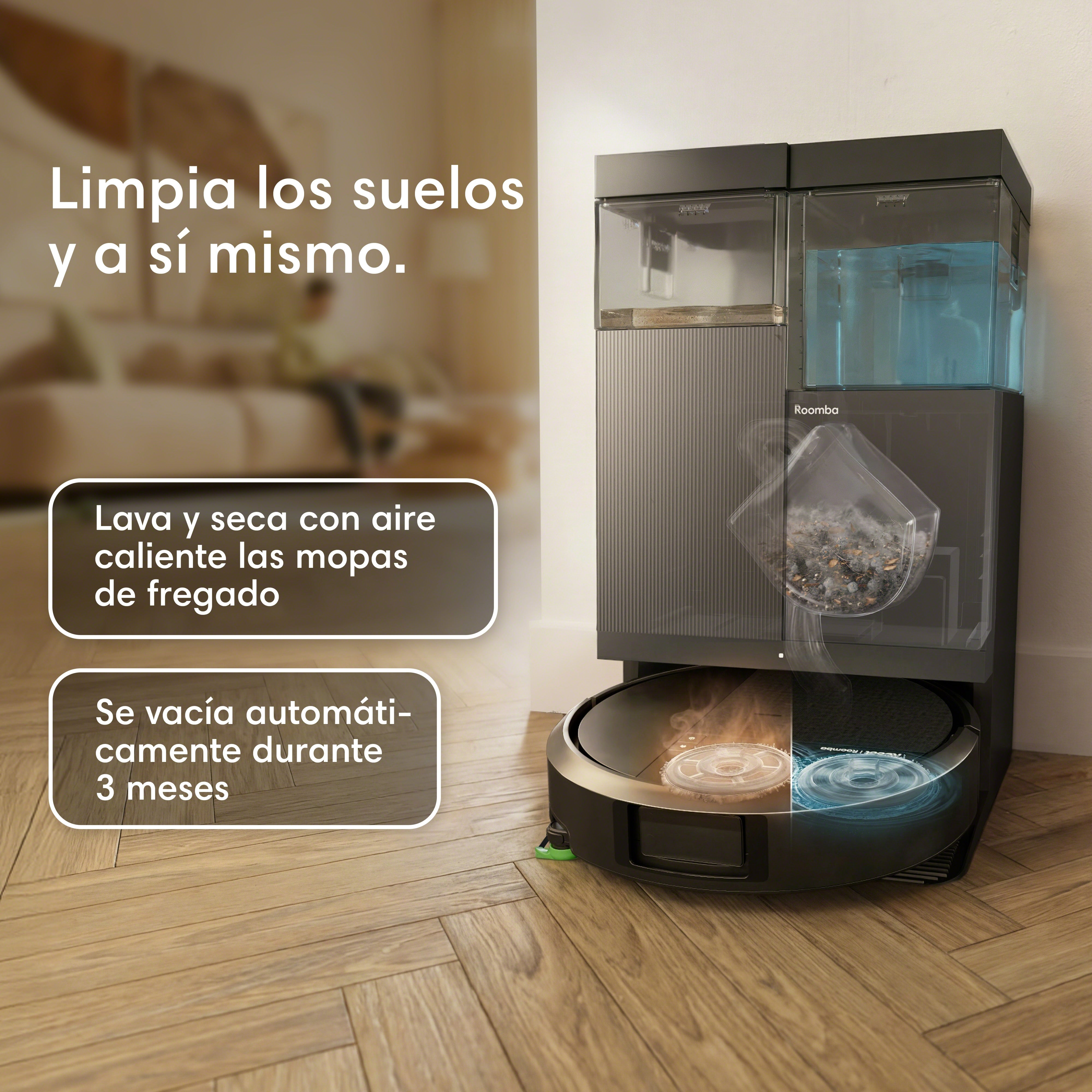 Robot aspirador Roomba en su base sobre suelo de madera con textos explicativos en español.