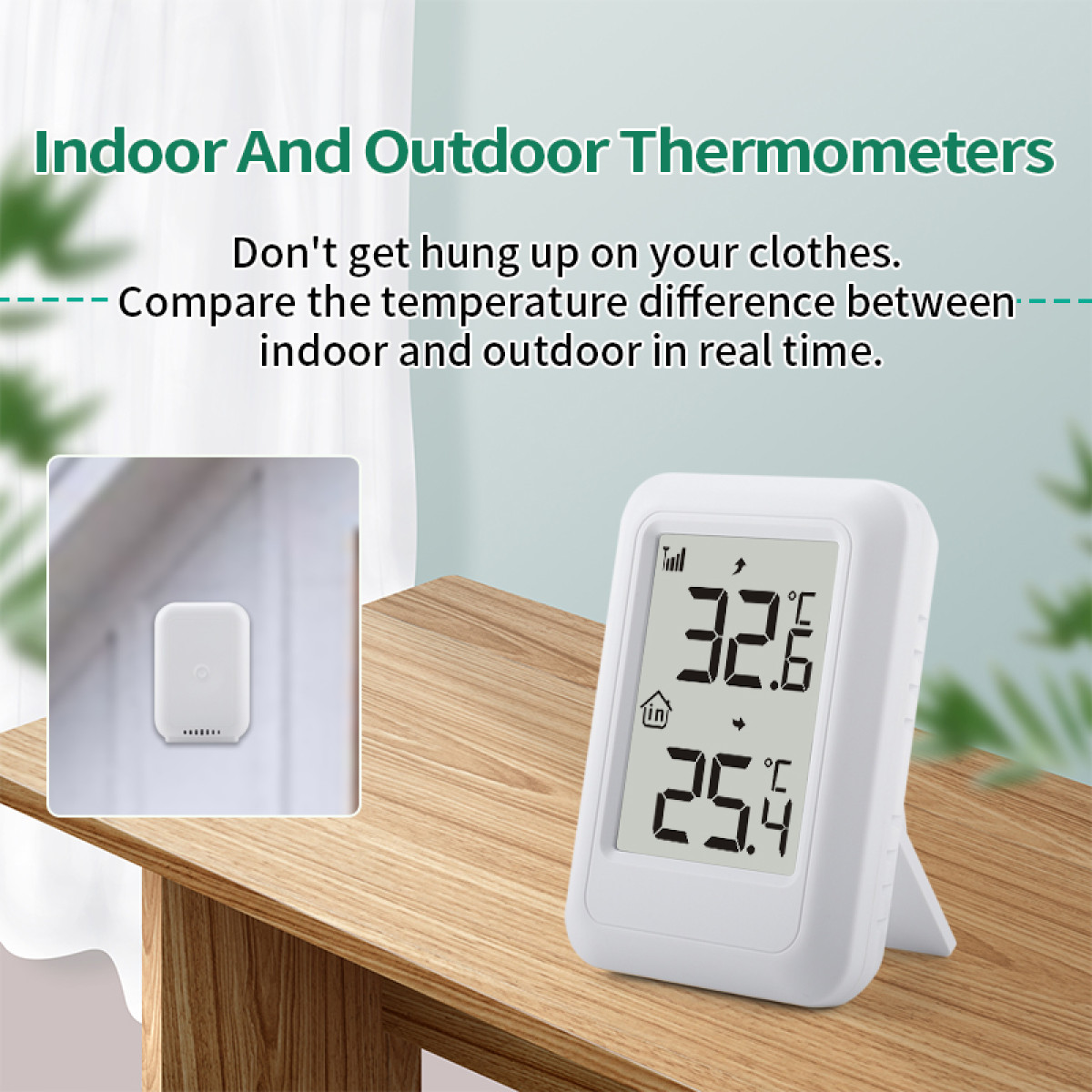 Ein weißes digitales Thermometer auf Holzoberfläche zeigt Innentemperaturen an.