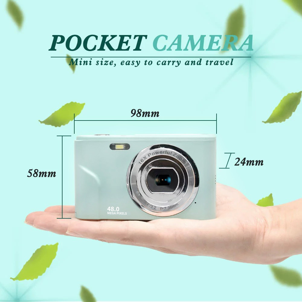 A hand holding a compact light green pocket camera with dimensions and text on a light blue background.