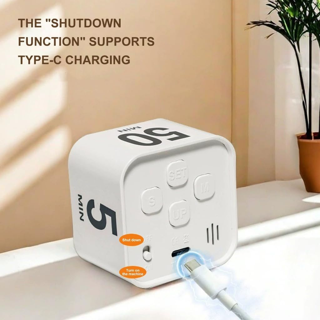 Ein weißer, würfelförmiger Timer mit Tasten wird per Typ-C-Kabel aufgeladen.
