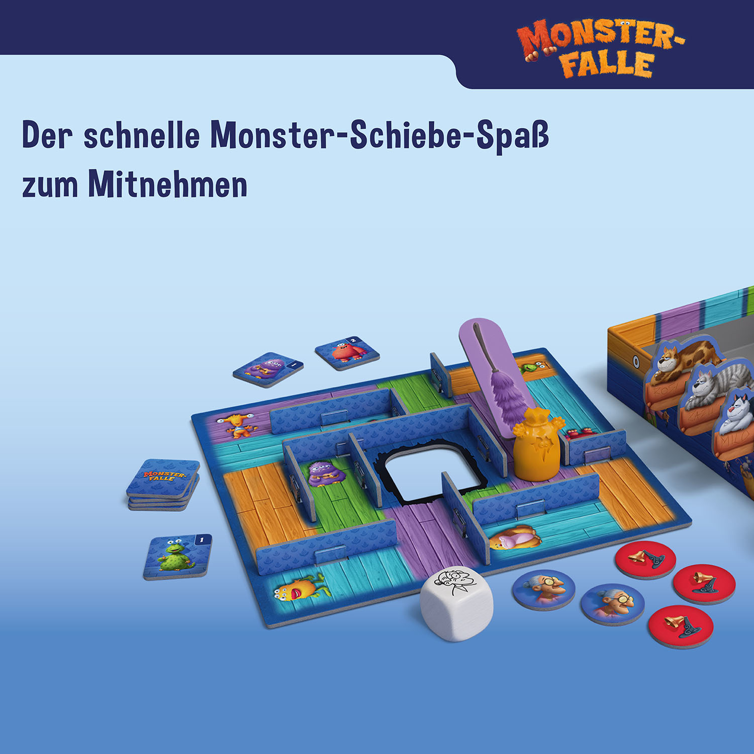 Das Brettspiel Monster-Falle mit bunten Wegen, Monsterkarten, Spielfiguren und einem Würfel.