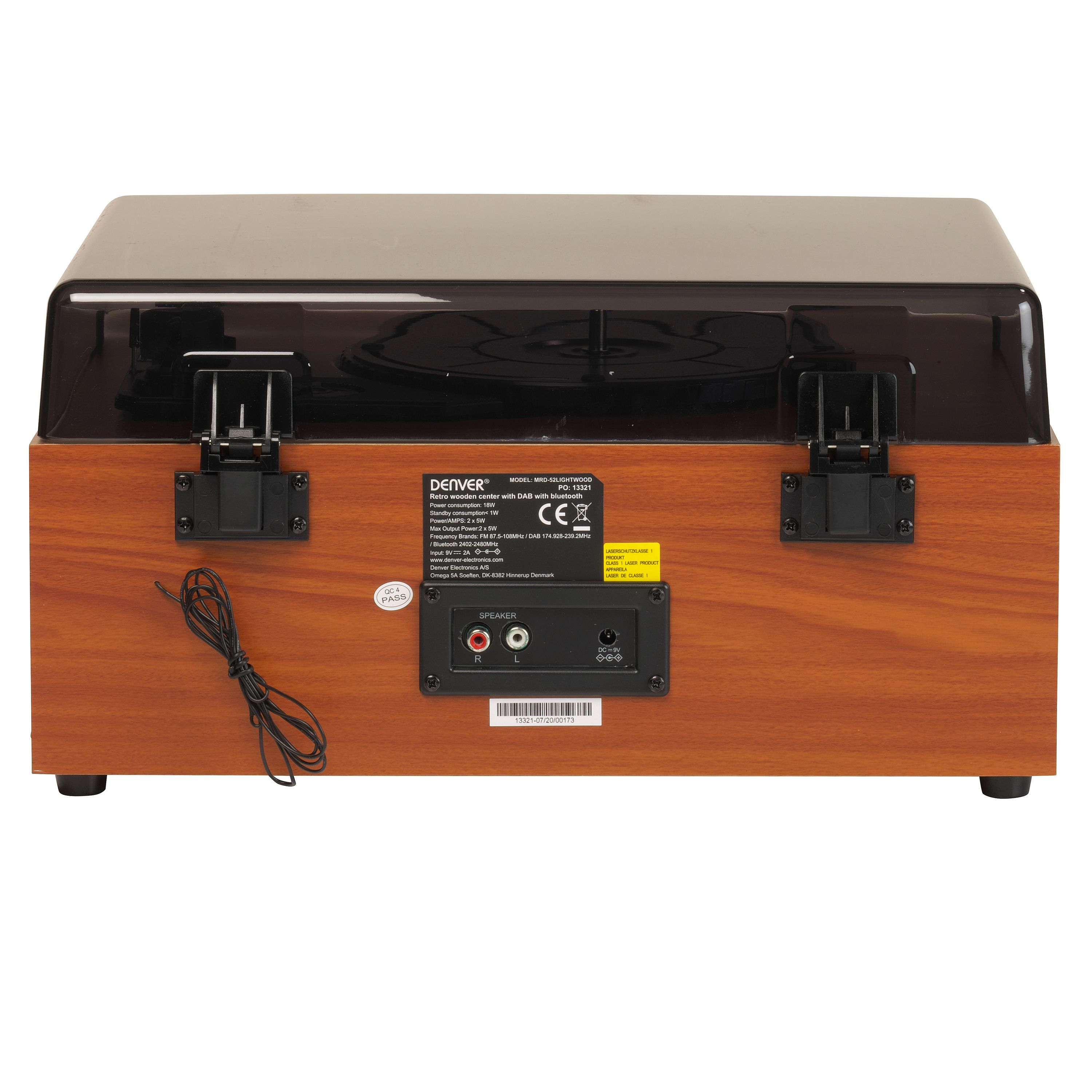 Vista posteriore di un giradischi in legno con porte audio, etichetta e coperchio antipolvere.