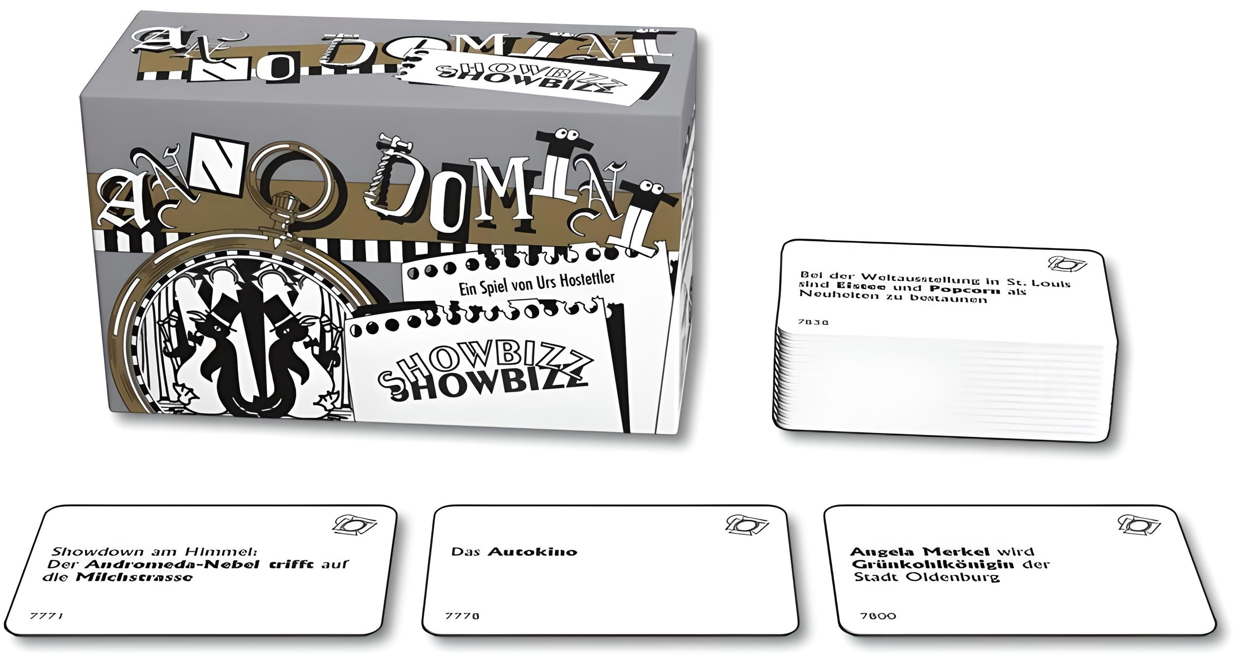 Spielschachtel und Spielkarten des Kartenspiels Anno Domini Showbizz auf weißem Hintergrund.