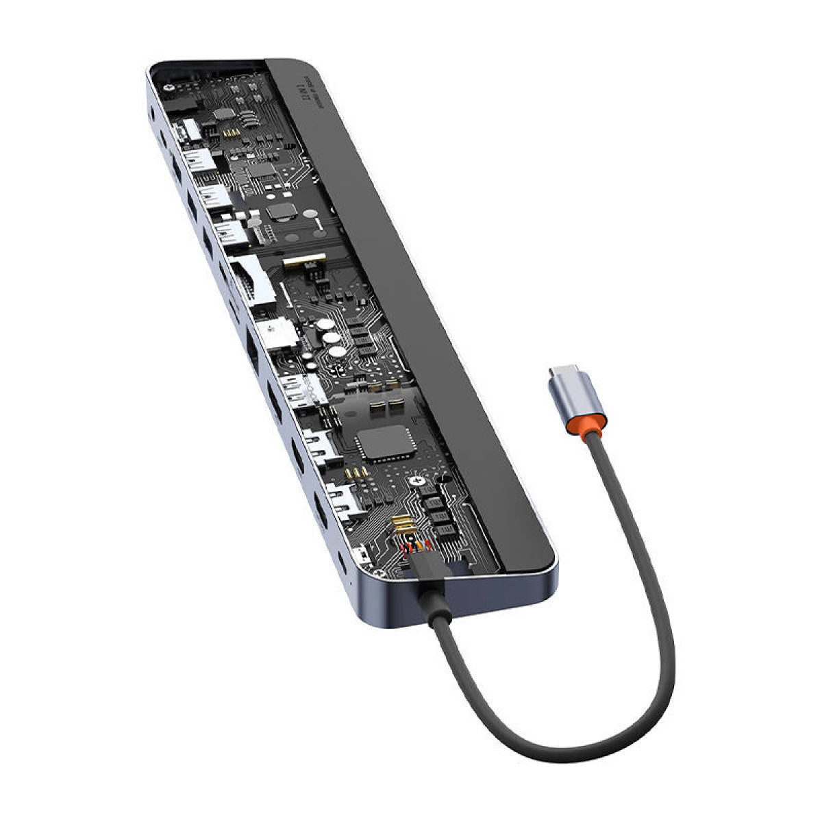 Un hub USB-C grigio con una scheda madre nera esposta, porte multiple e un cavo collegato.