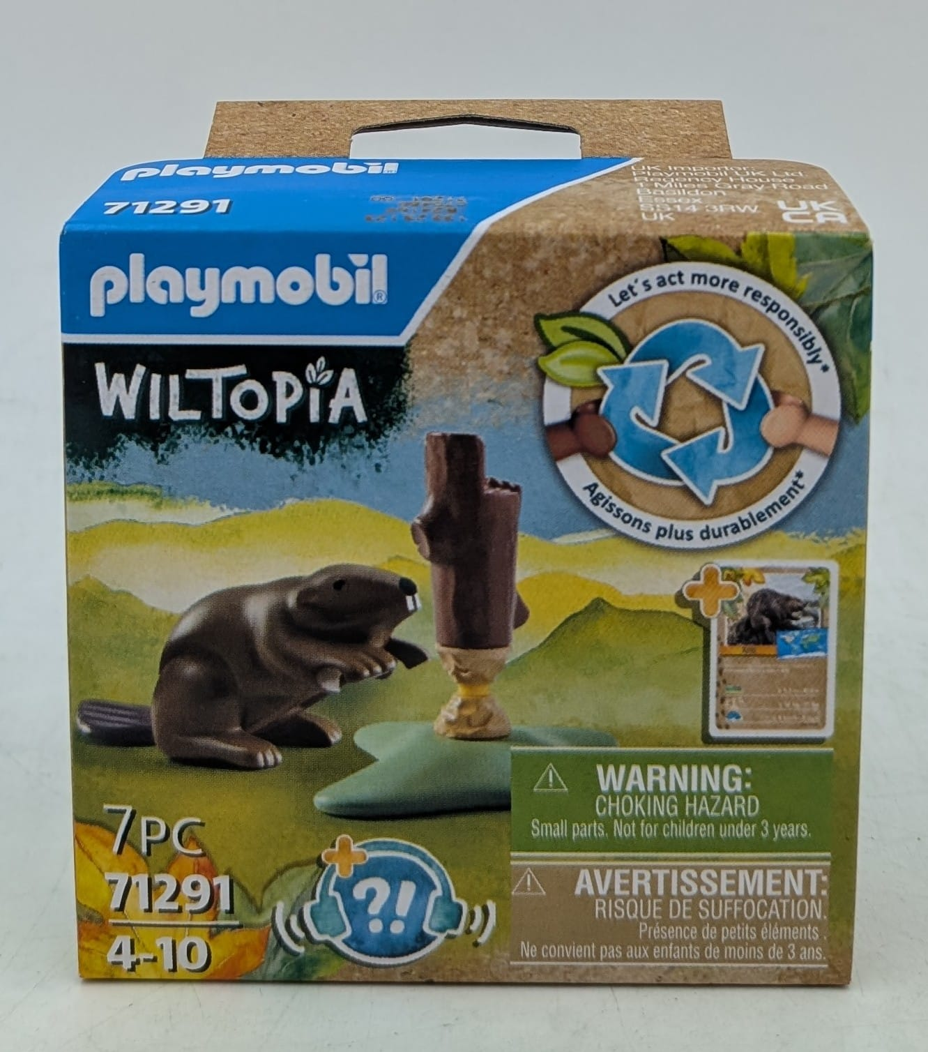 Playmobil Wiltopia 71291 Spielzeugschachtel mit Biberfigur und Baumstumpf in Graslandschaft.
