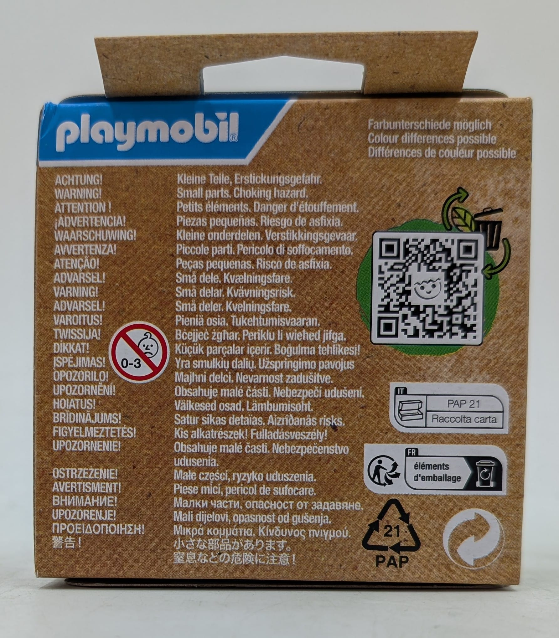 Playmobil-Verpackungsrückseite mit mehrsprachigen Warnhinweisen, QR-Code und Recycling-Symbolen.