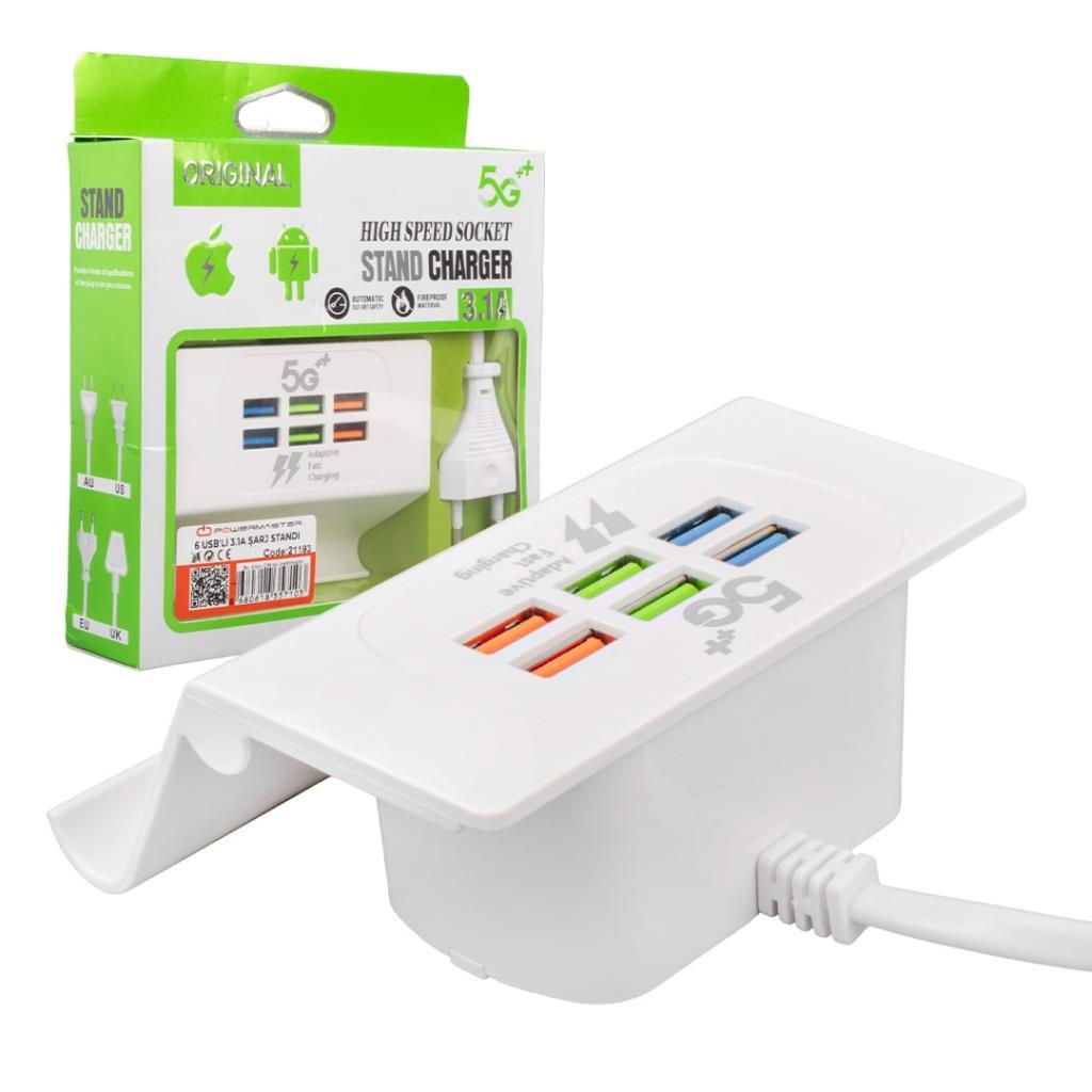 Yeşil ve beyaz ambalajının önünde altı USB portlu beyaz stant şarj cihazı.