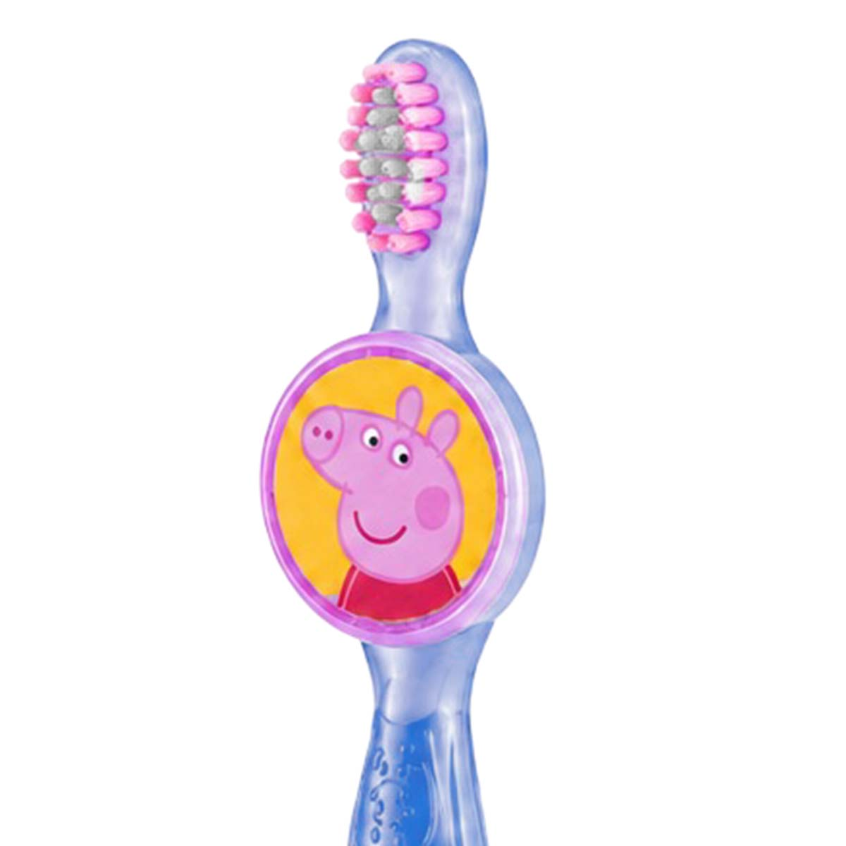 Uno spazzolino da denti blu per bambini con setole rosa e grigie e un grafico di Peppa Pig sul manico.