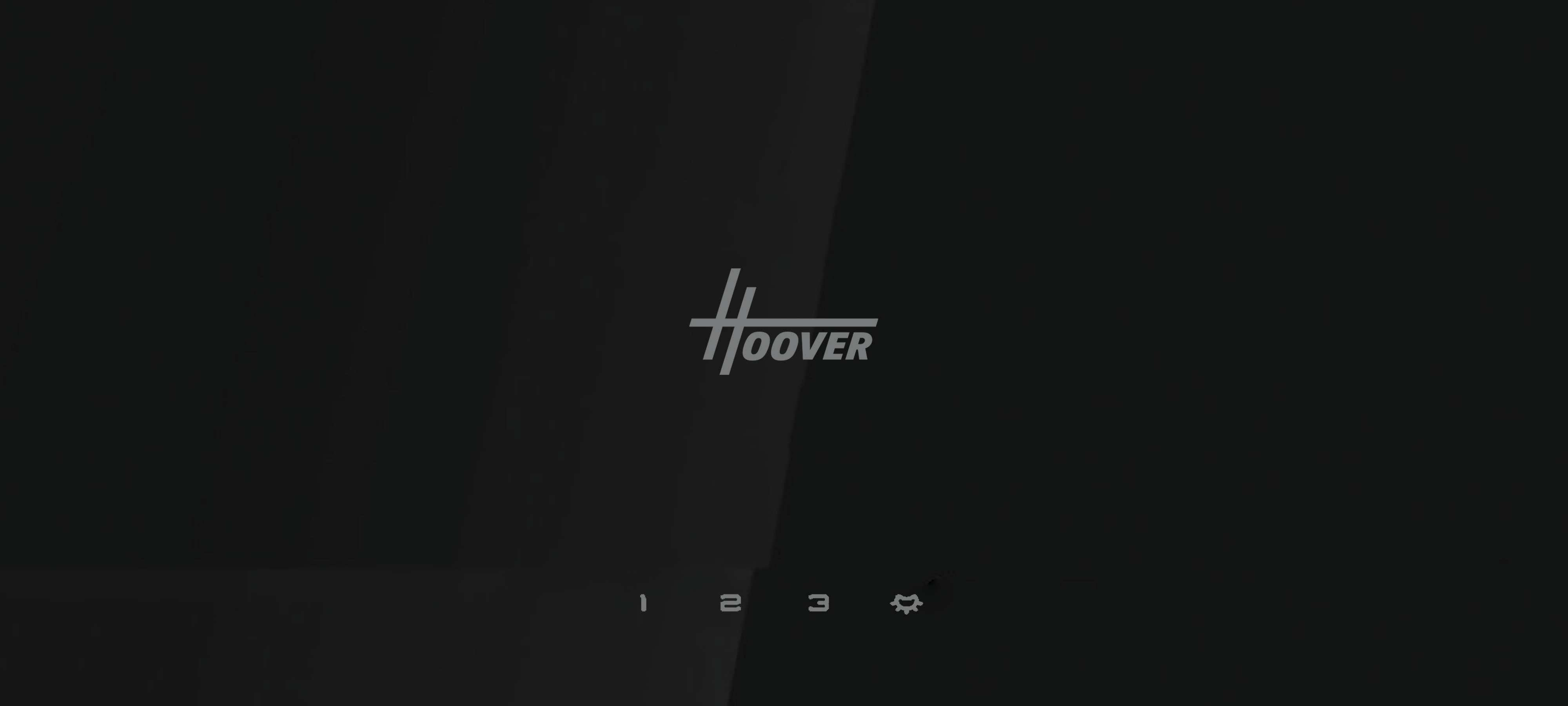 Ortasında Hoover logosu ve altta dokunmatik düğmeler bulunan karanlık bir kontrol paneli.