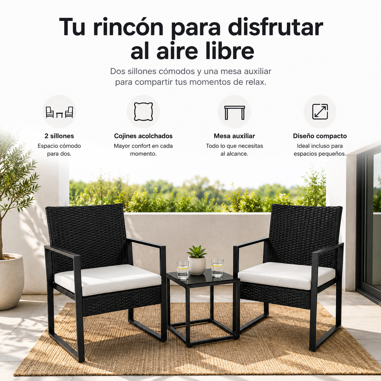 Conjunto de exterior con dos sillones de ratán negro con cojines blancos y una pequeña mesa auxiliar a juego.