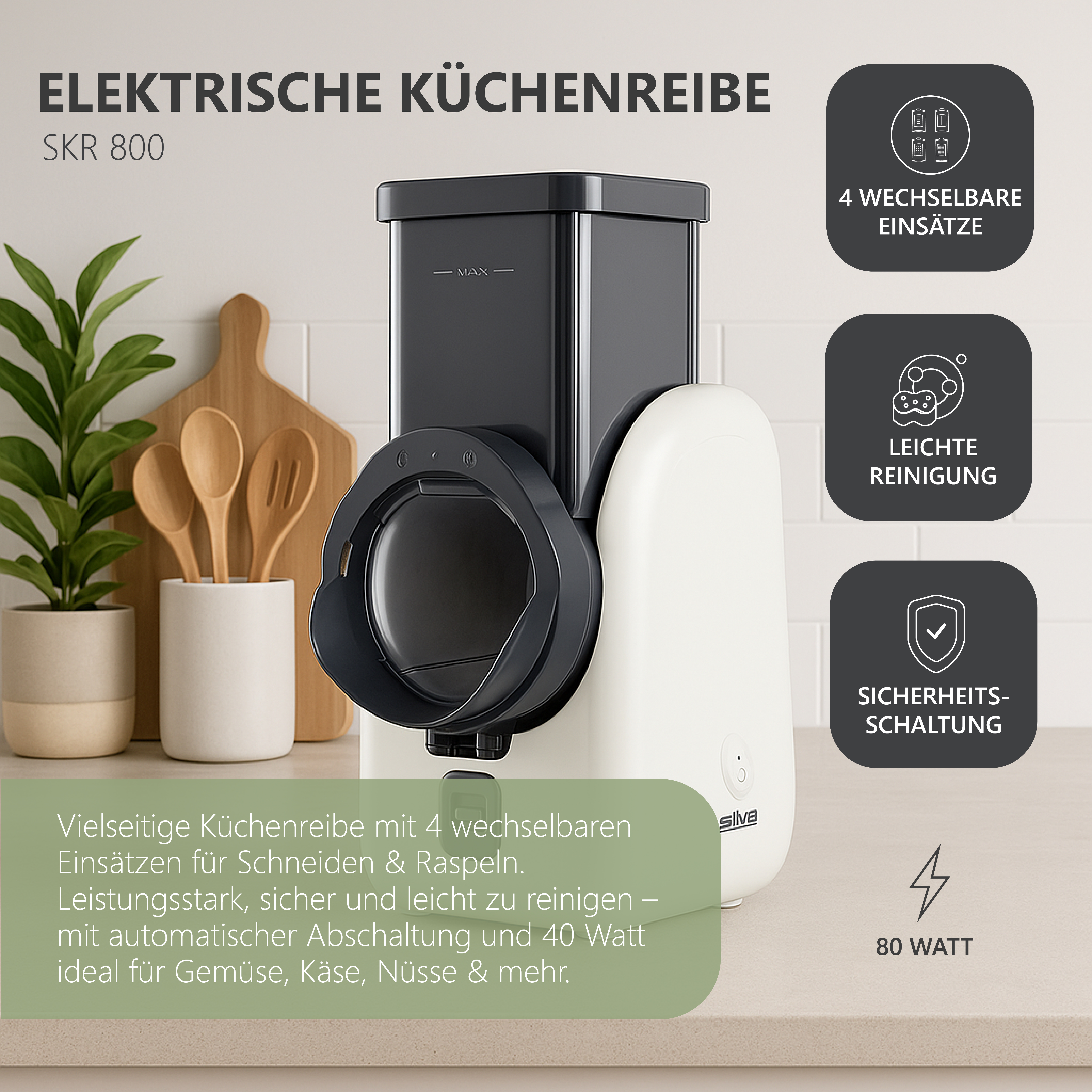 Grattugia da cucina elettrica bianca e nera con icone delle funzioni su un piano di lavoro.